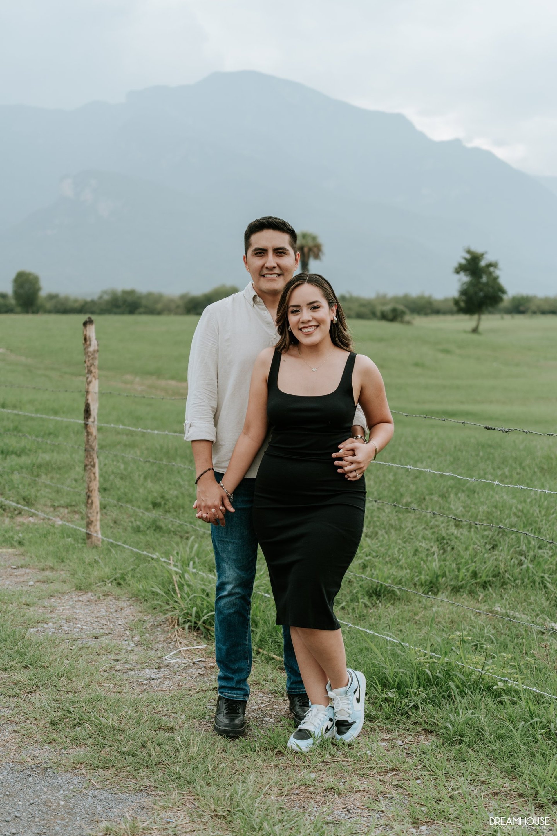 couple wearing silver-colored rings