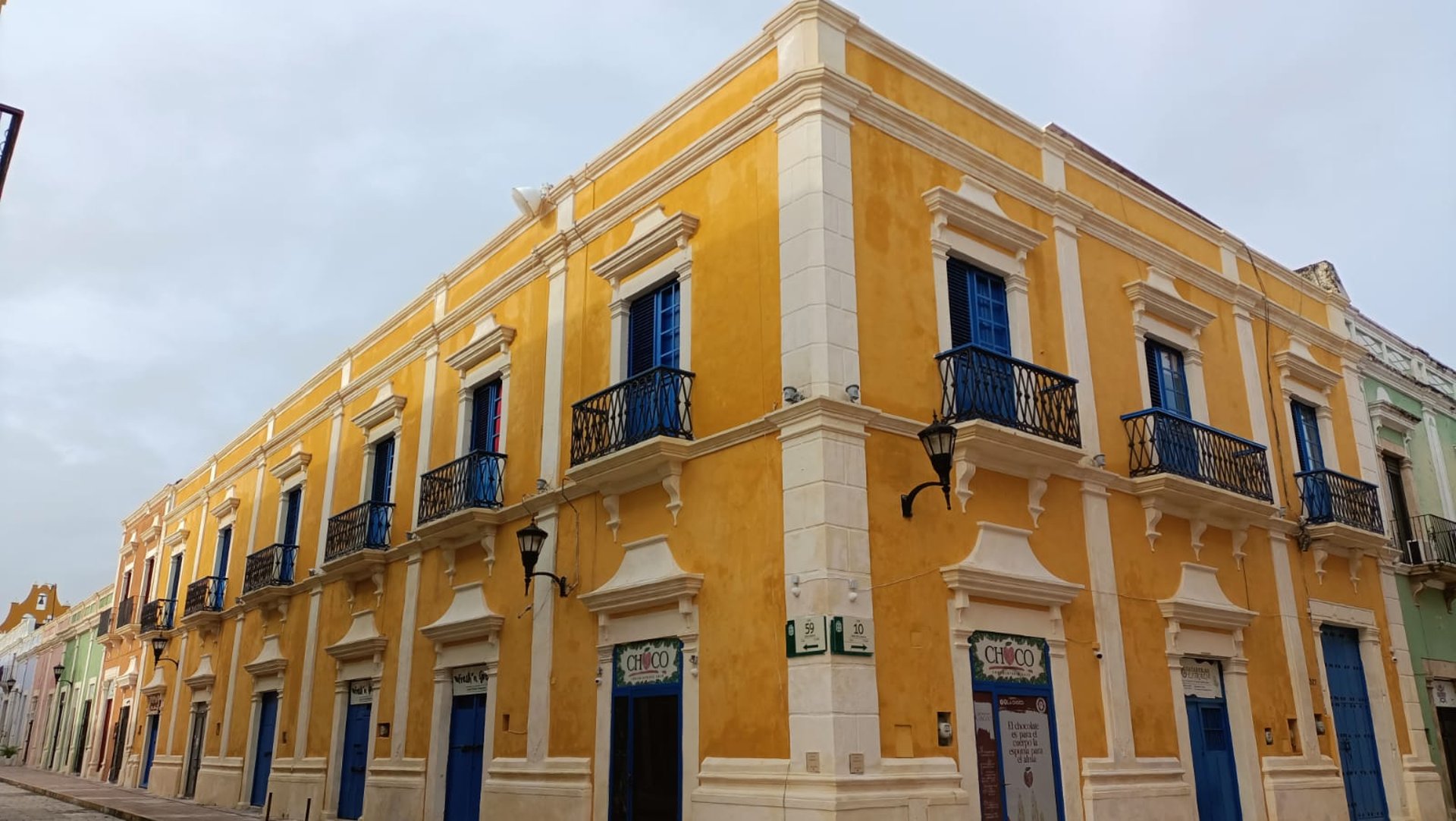 black and brown leather padded tub sofa
