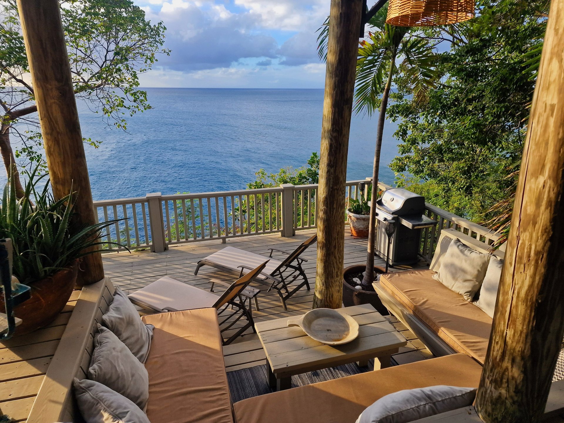 woman wearing yellow long-sleeved dress under white clouds and blue sky during daytime