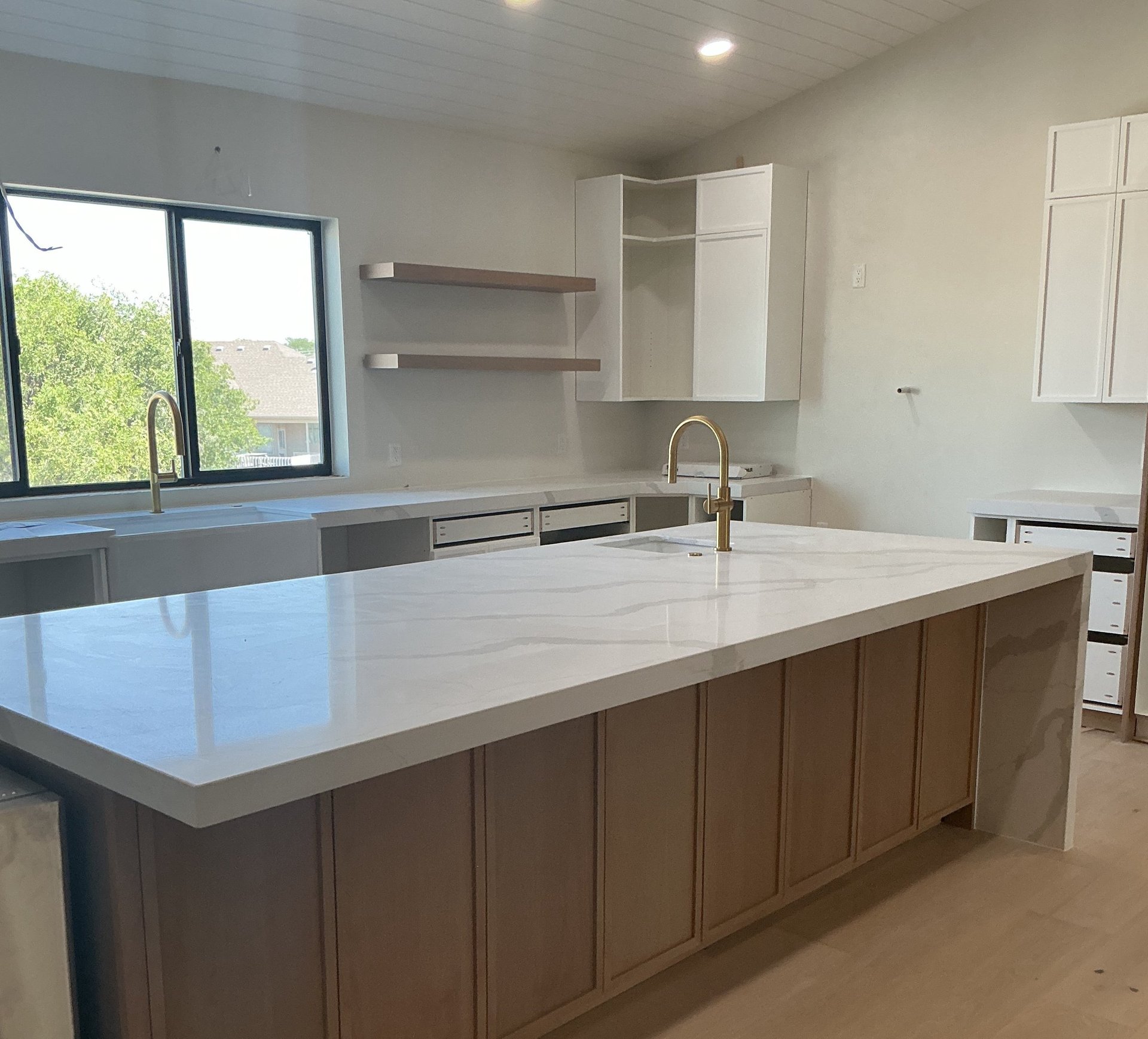 black and brown leather padded tub sofa