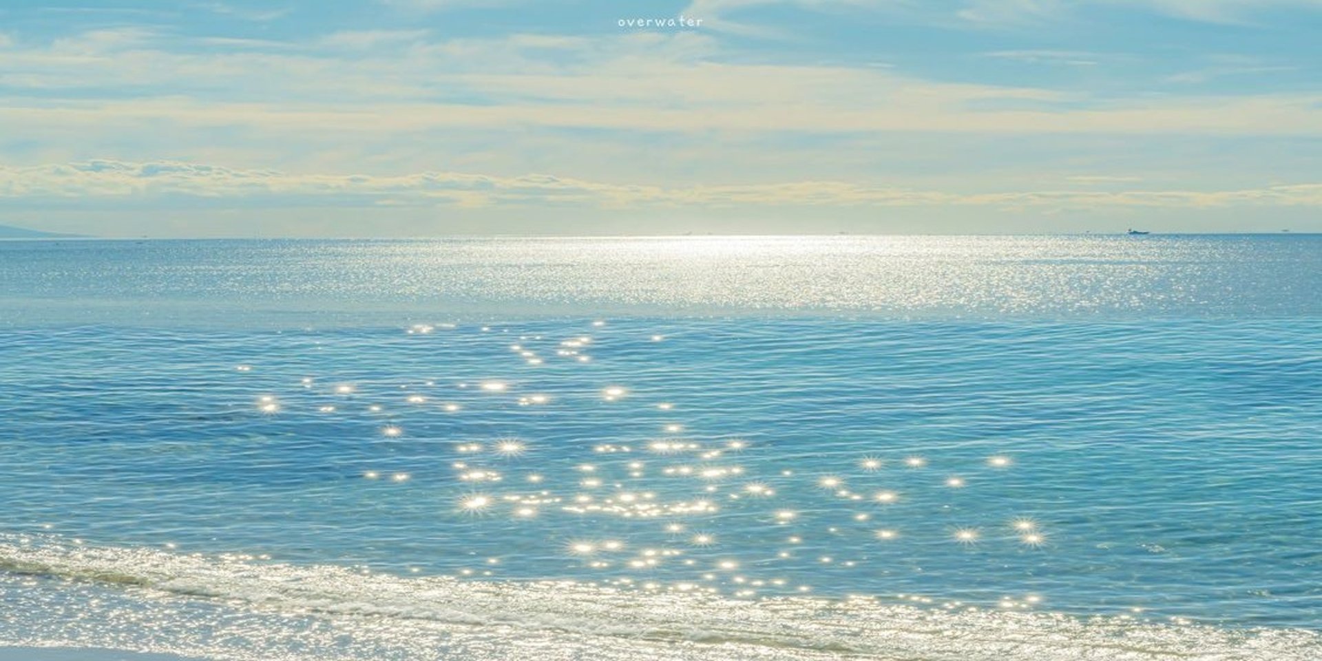 ocean waves crashing on shore during daytime