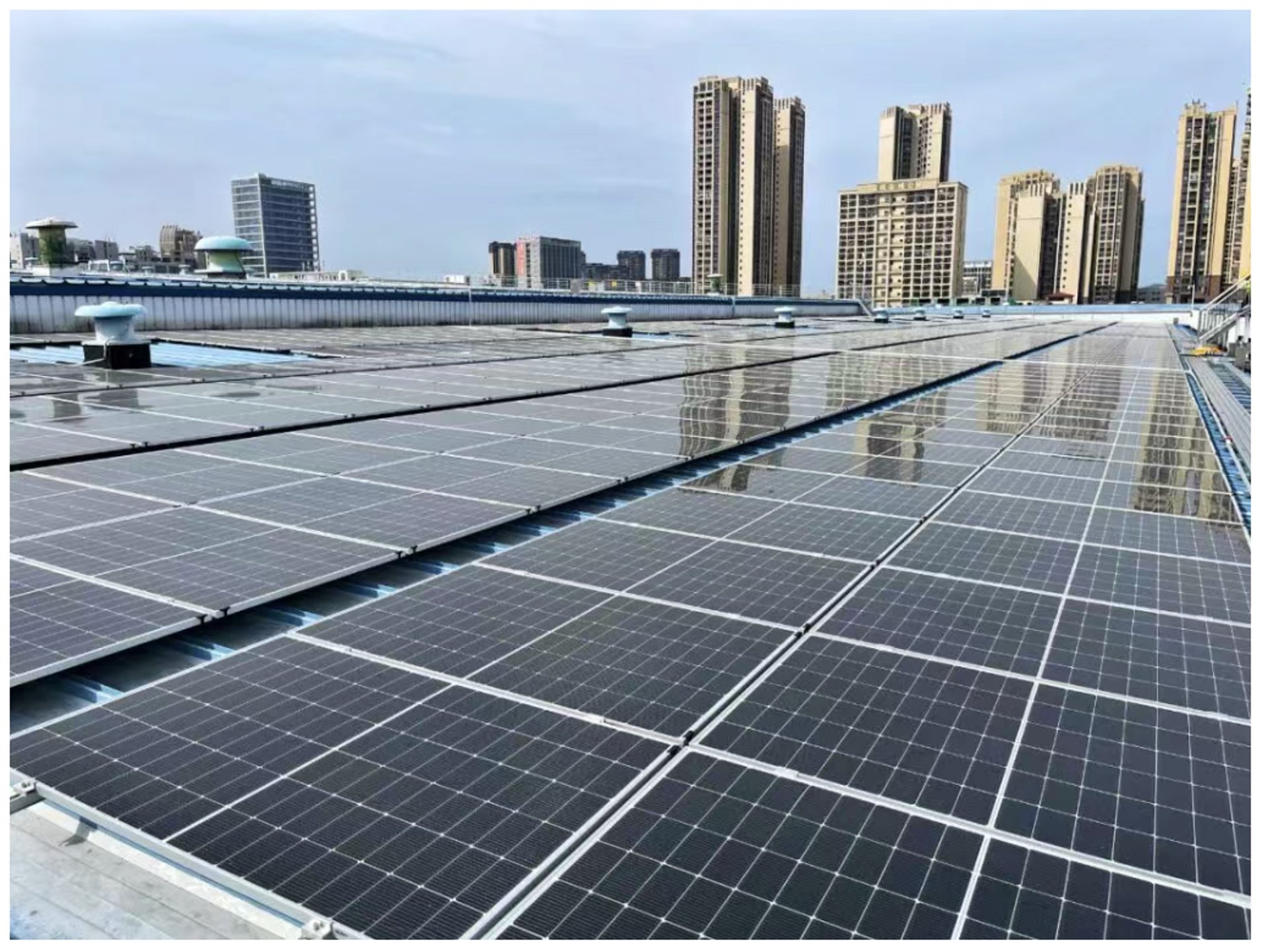 an abstract photo of a curved building with a blue sky in the background