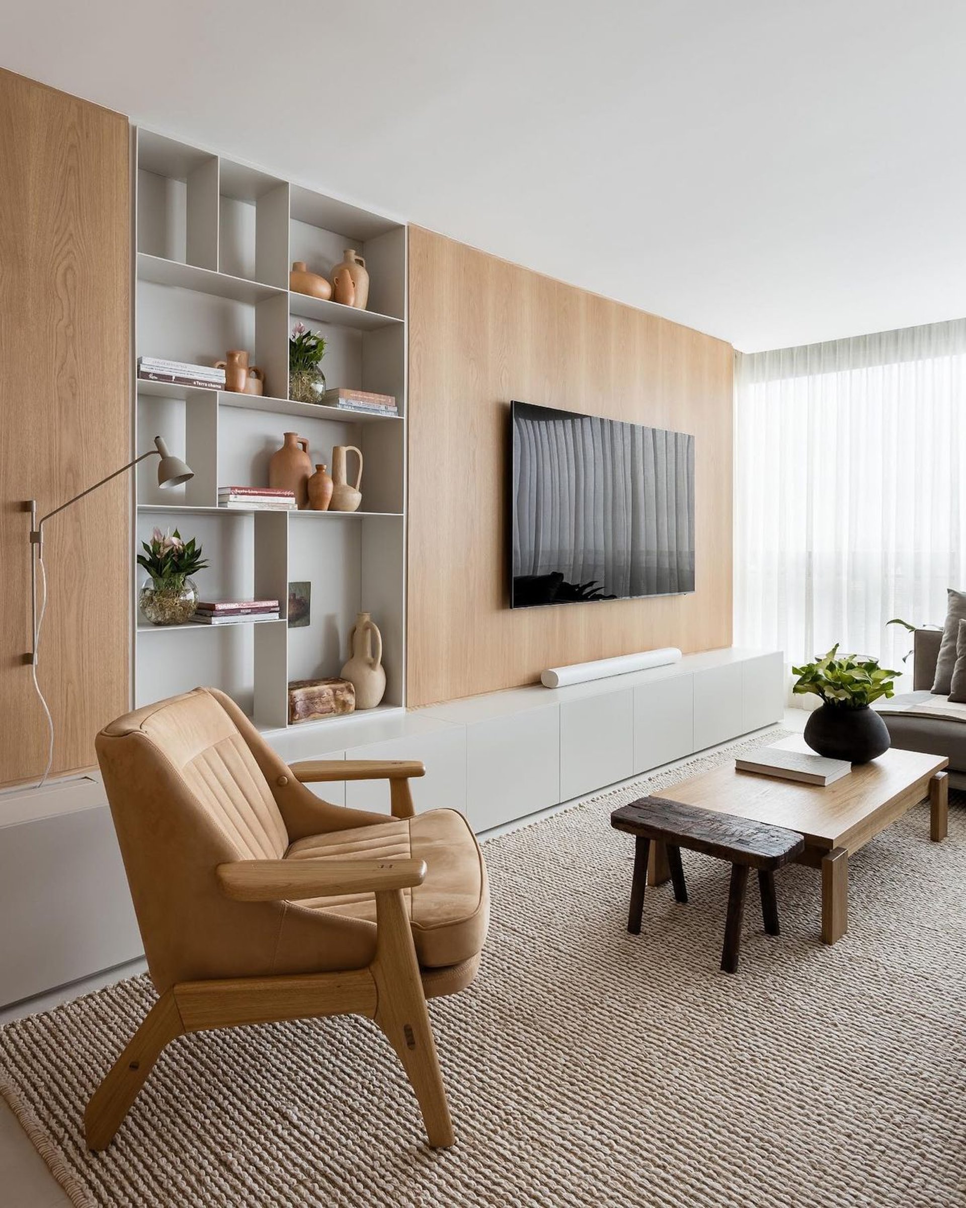 black and brown leather padded tub sofa