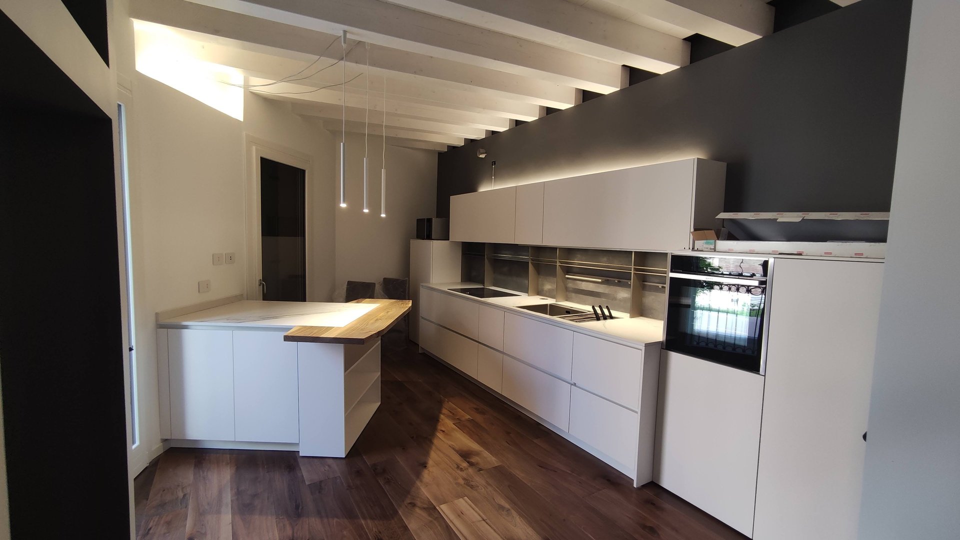 white wooden kitchen cabinet over white kitchen counter