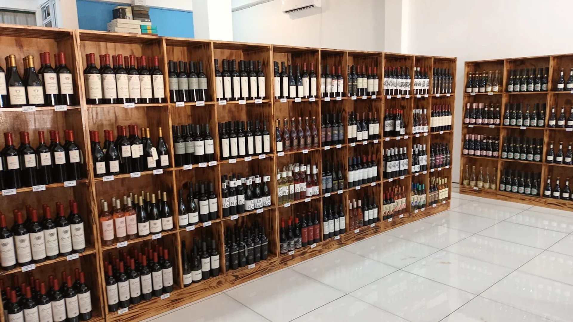 an abstract photo of a curved building with a blue sky in the background