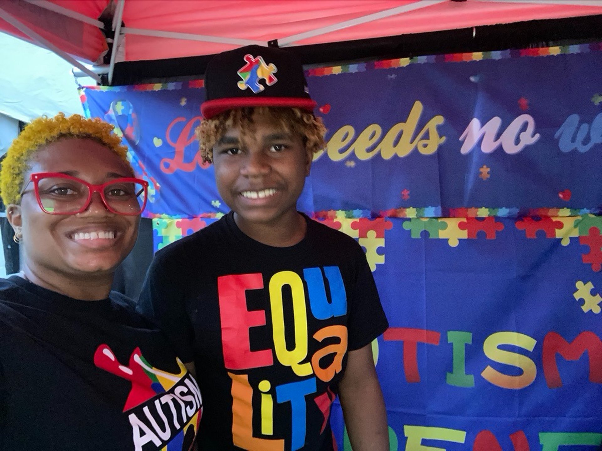 woman wearing yellow long-sleeved dress under white clouds and blue sky during daytime