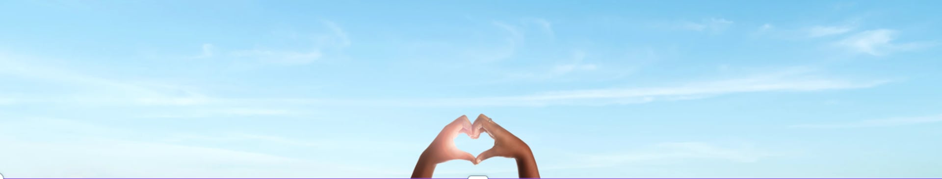 woman wearing yellow long-sleeved dress under white clouds and blue sky during daytime