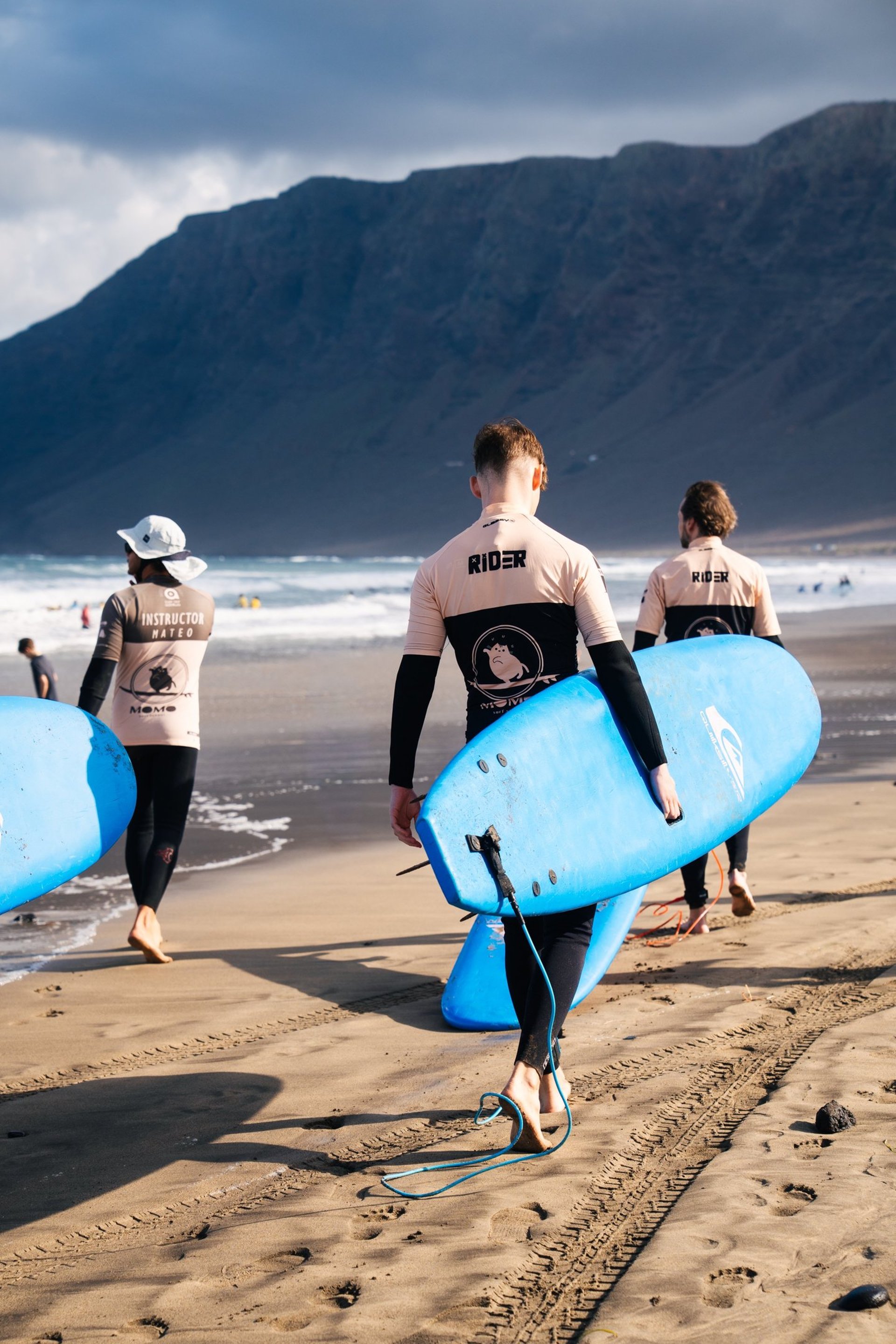 an abstract photo of a curved building with a blue sky in the background