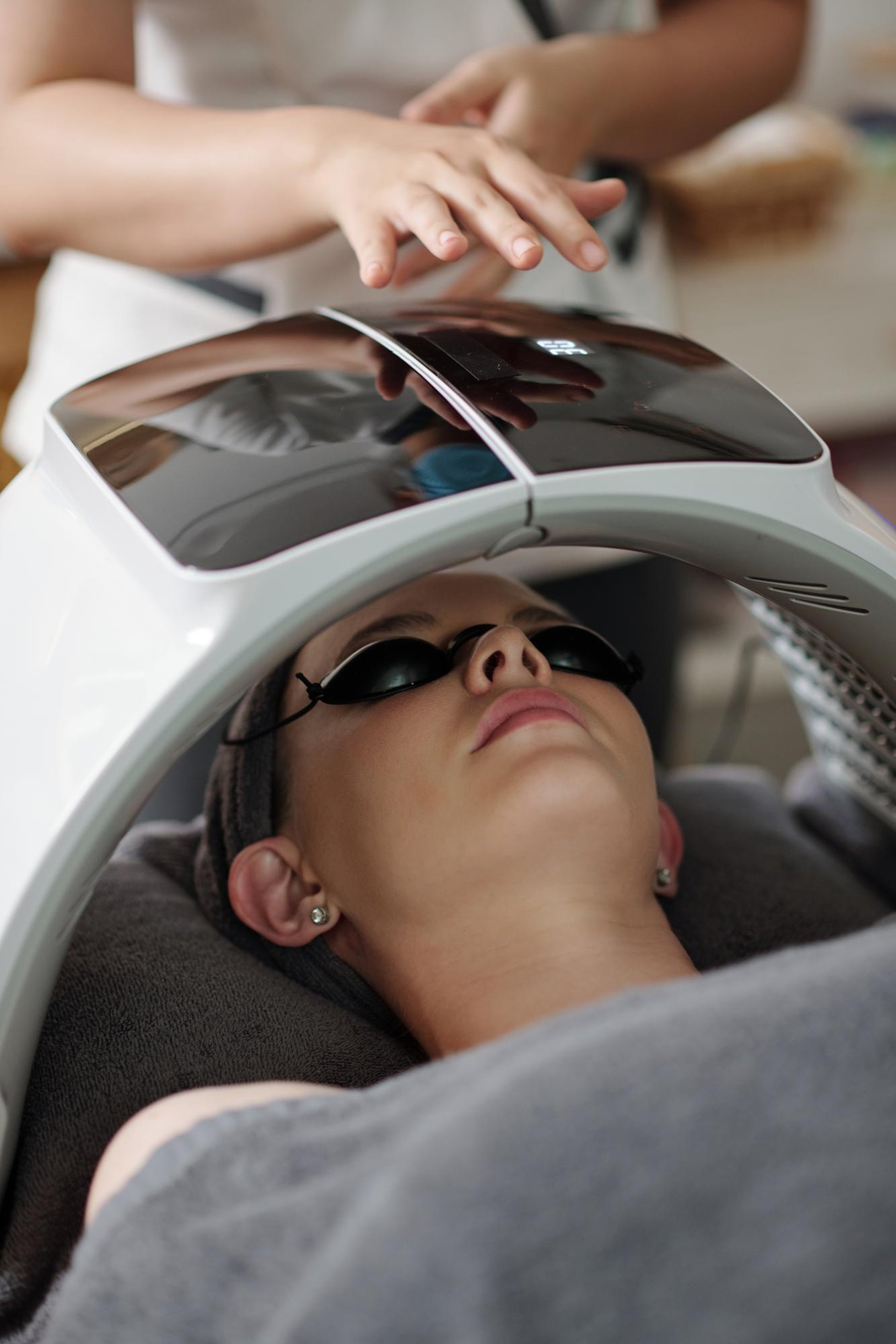 a blurry image of a woman in a blue dress