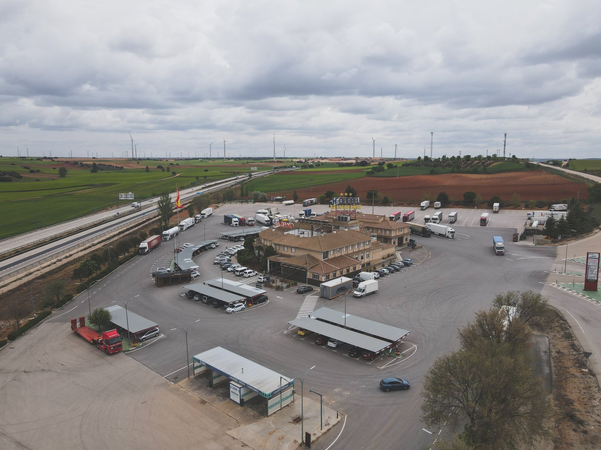 an abstract photo of a curved building with a blue sky in the background
