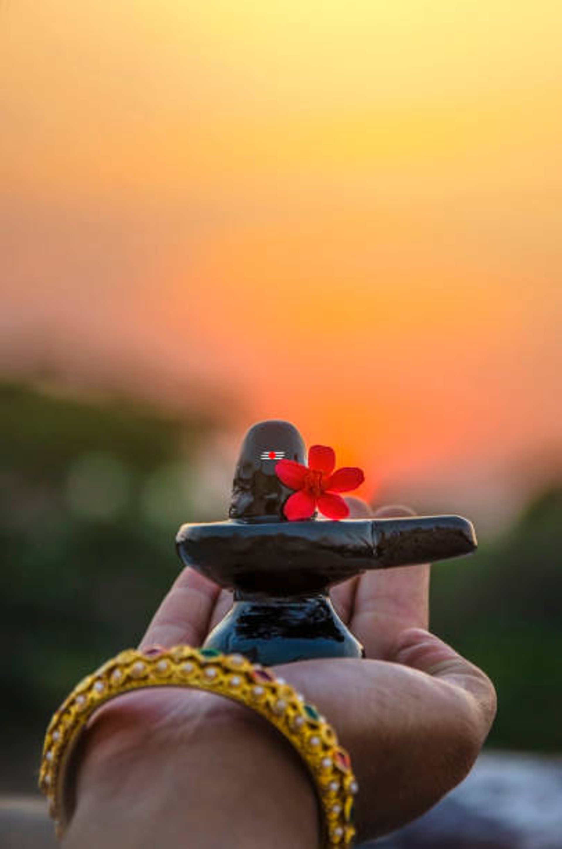 a statue of a person sitting in a lotus position