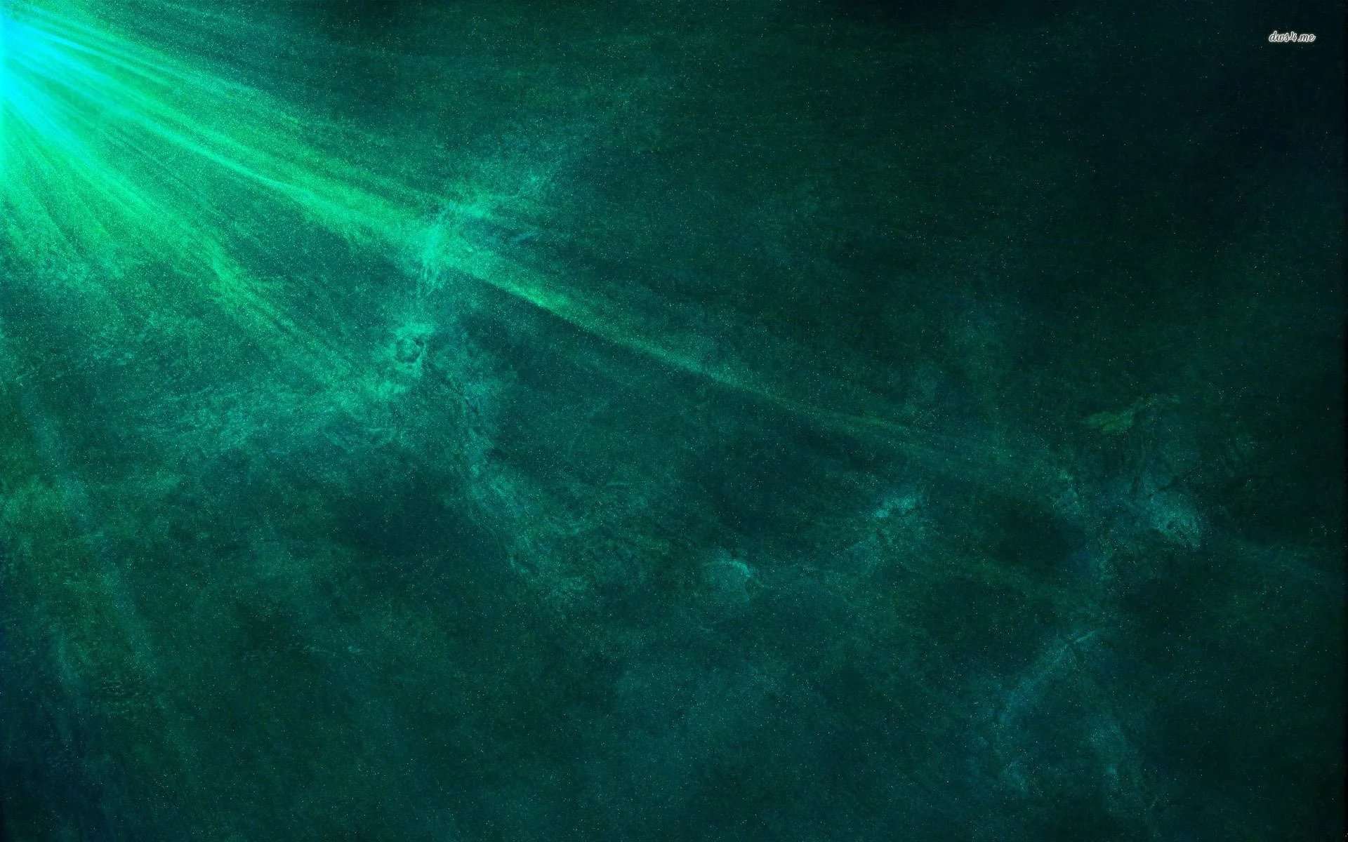a close up of a green surface with a small patch of grass