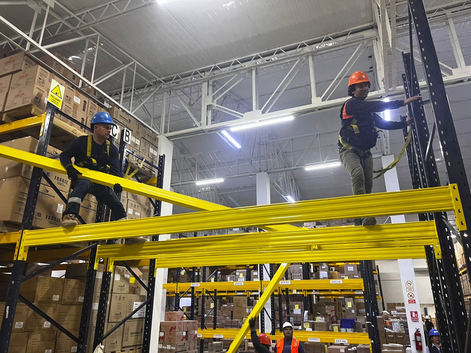 man climbing on ladder inside room