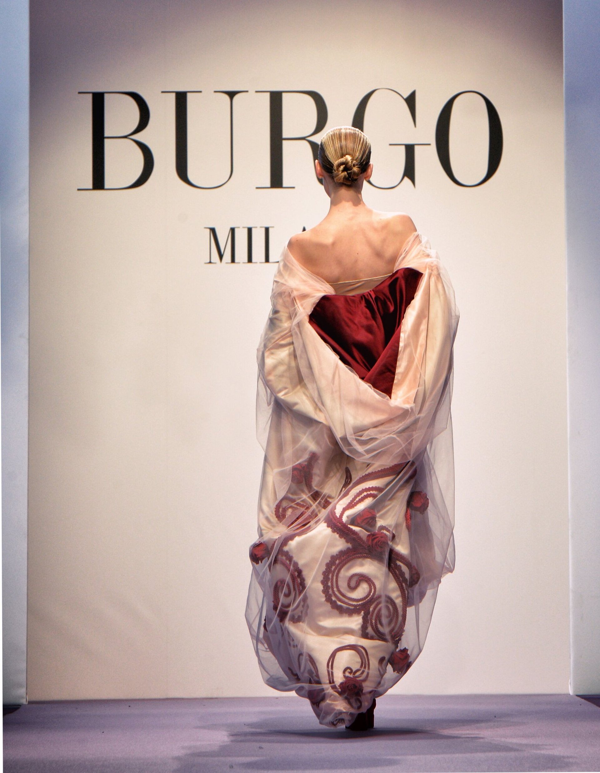 a view of a city with mountains in the background