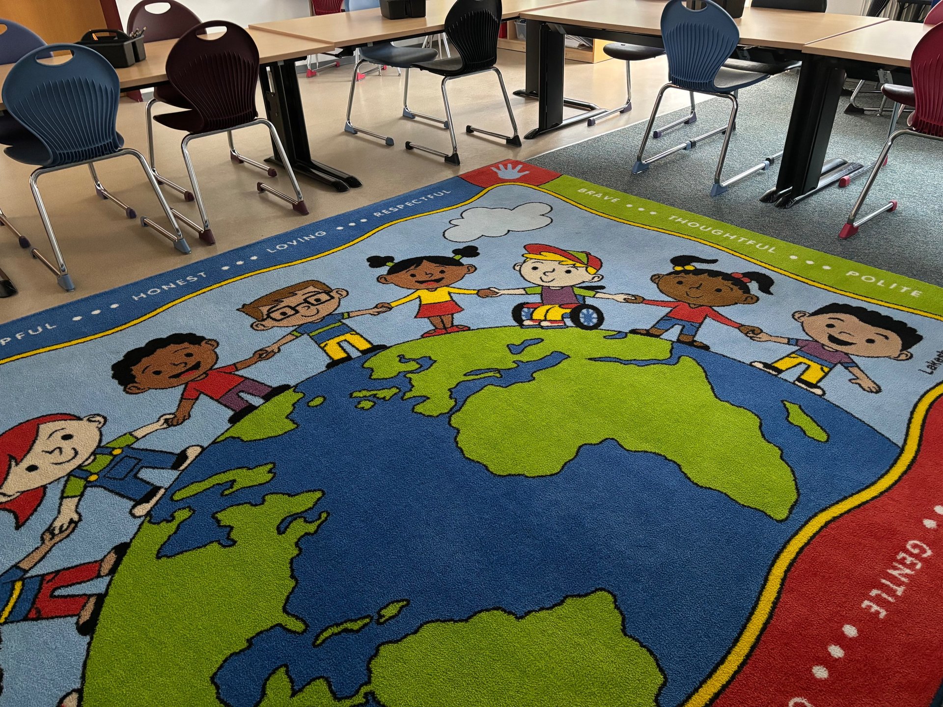 an abstract photo of a curved building with a blue sky in the background