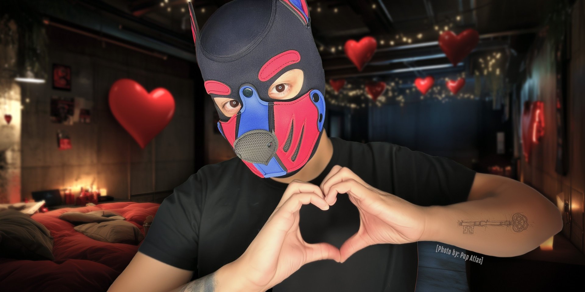 A man wearing a pup mask and santa hat poses for a Christmas picture