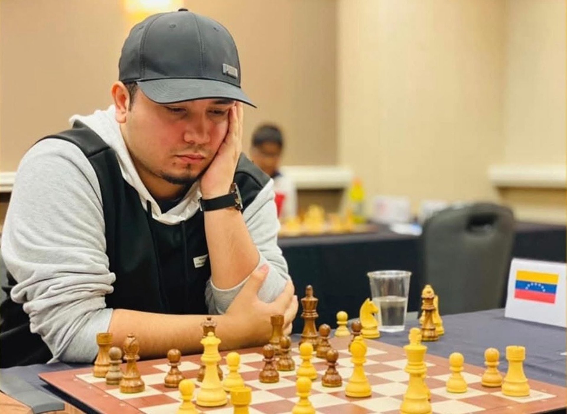 an abstract photo of a curved building with a blue sky in the background