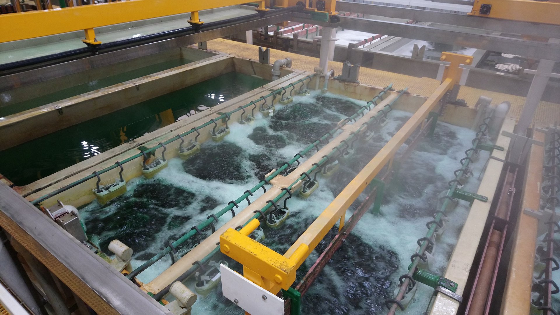 an abstract photo of a curved building with a blue sky in the background