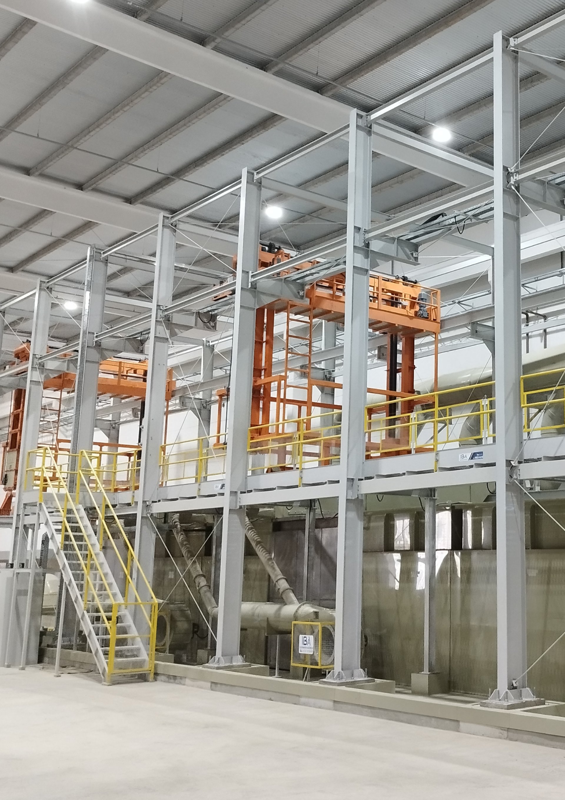 an abstract photo of a curved building with a blue sky in the background