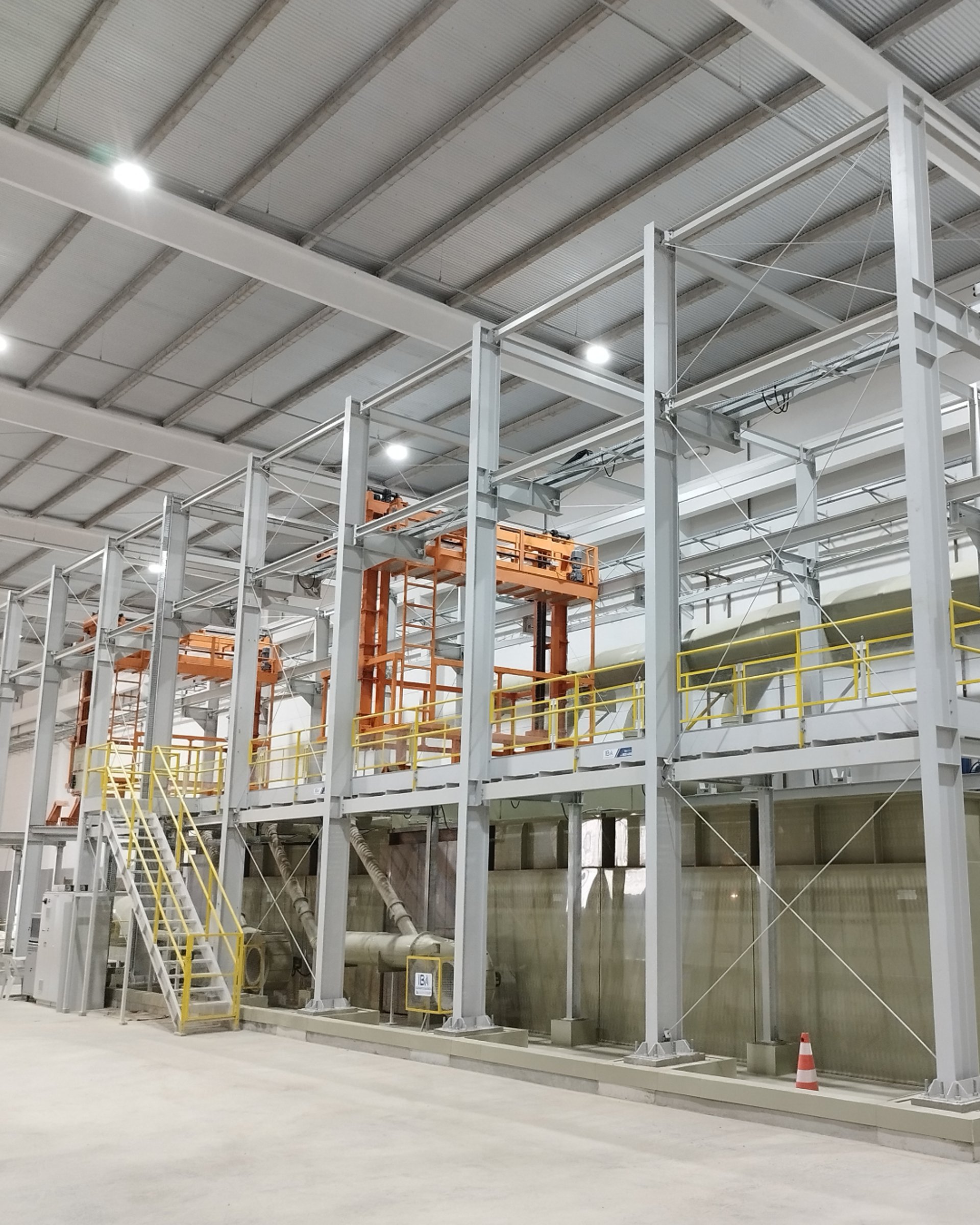an abstract photo of a curved building with a blue sky in the background