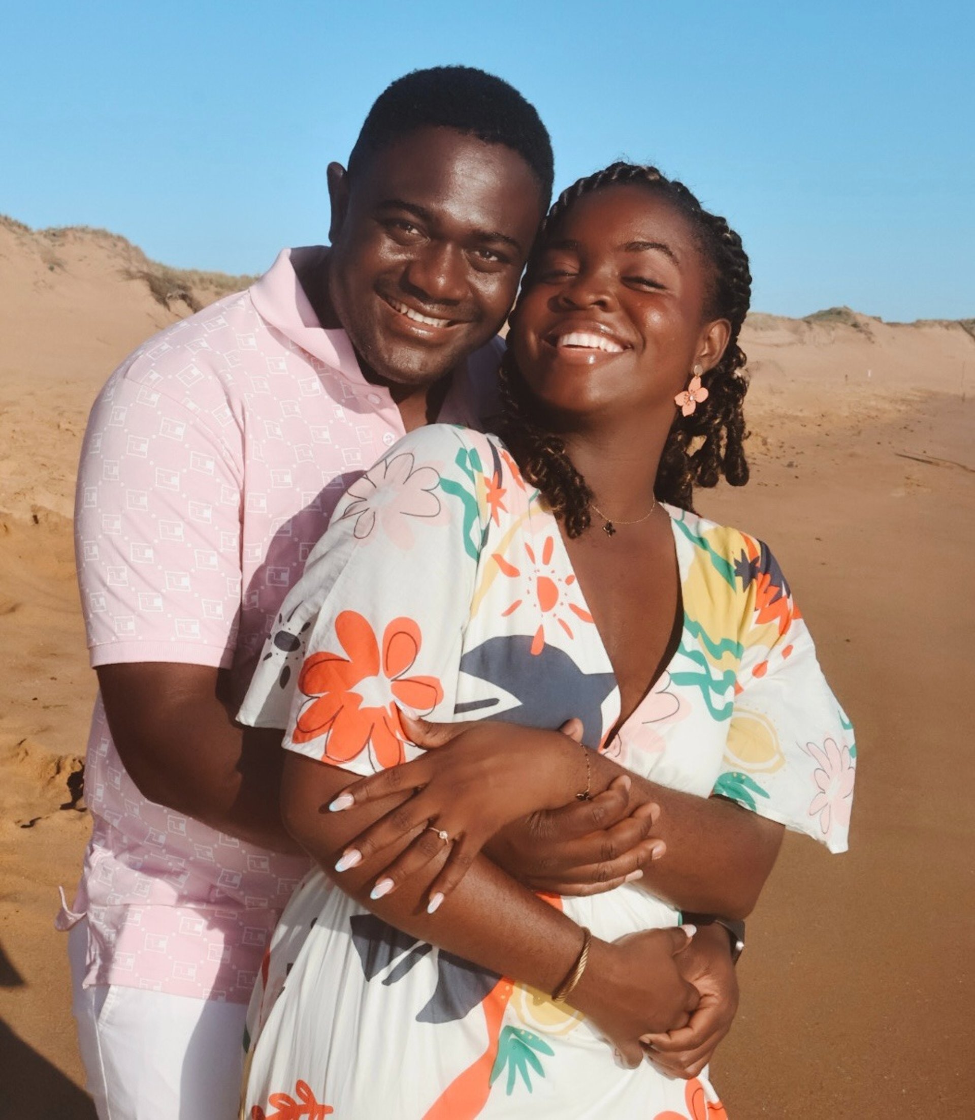 couple wearing silver-colored rings