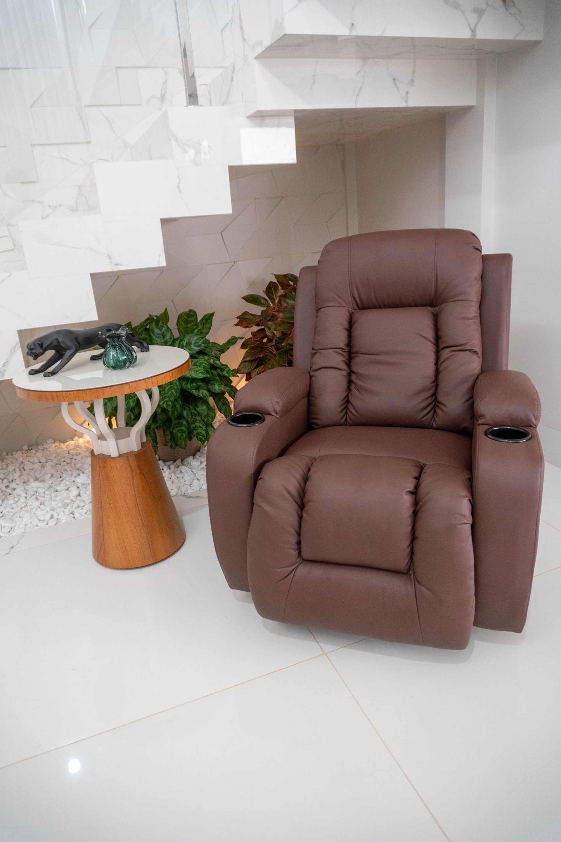 black and brown leather padded tub sofa