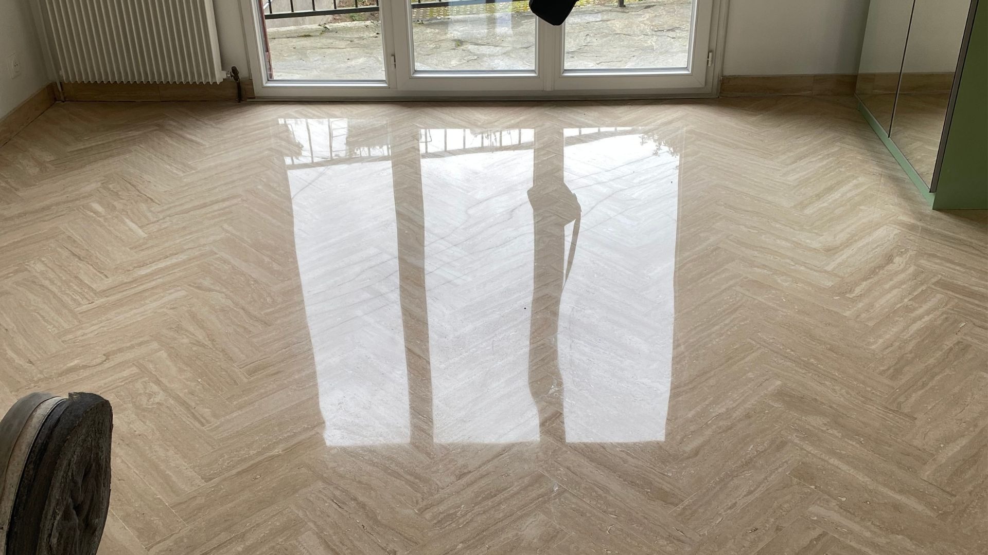 white concrete post on black and white checkered floor