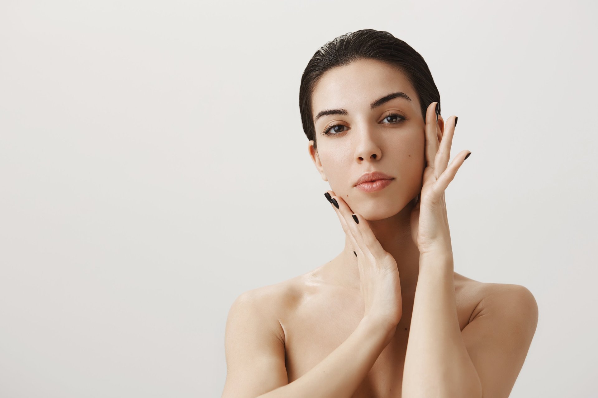 woman wearing yellow long-sleeved dress under white clouds and blue sky during daytime