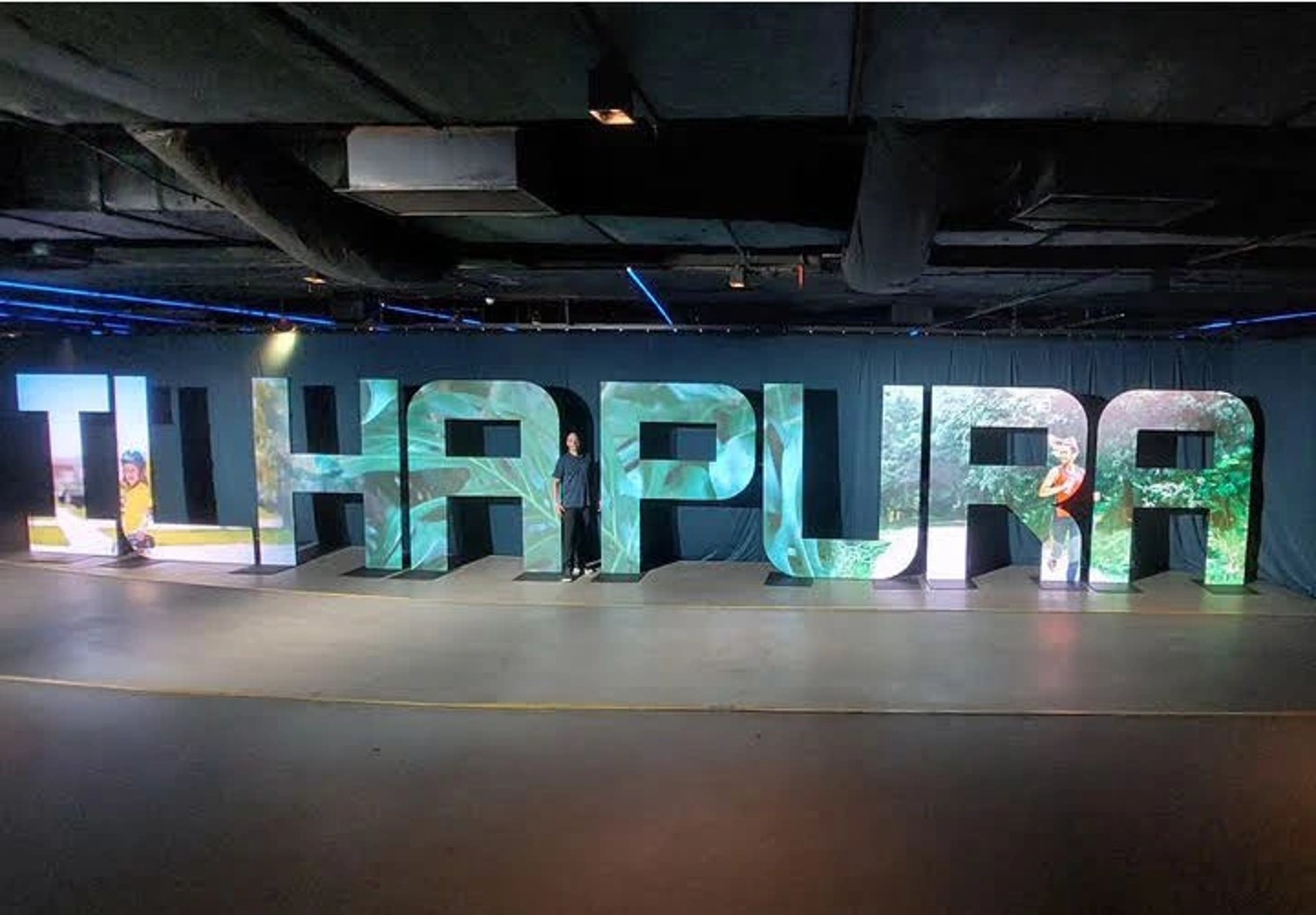 woman wearing yellow long-sleeved dress under white clouds and blue sky during daytime