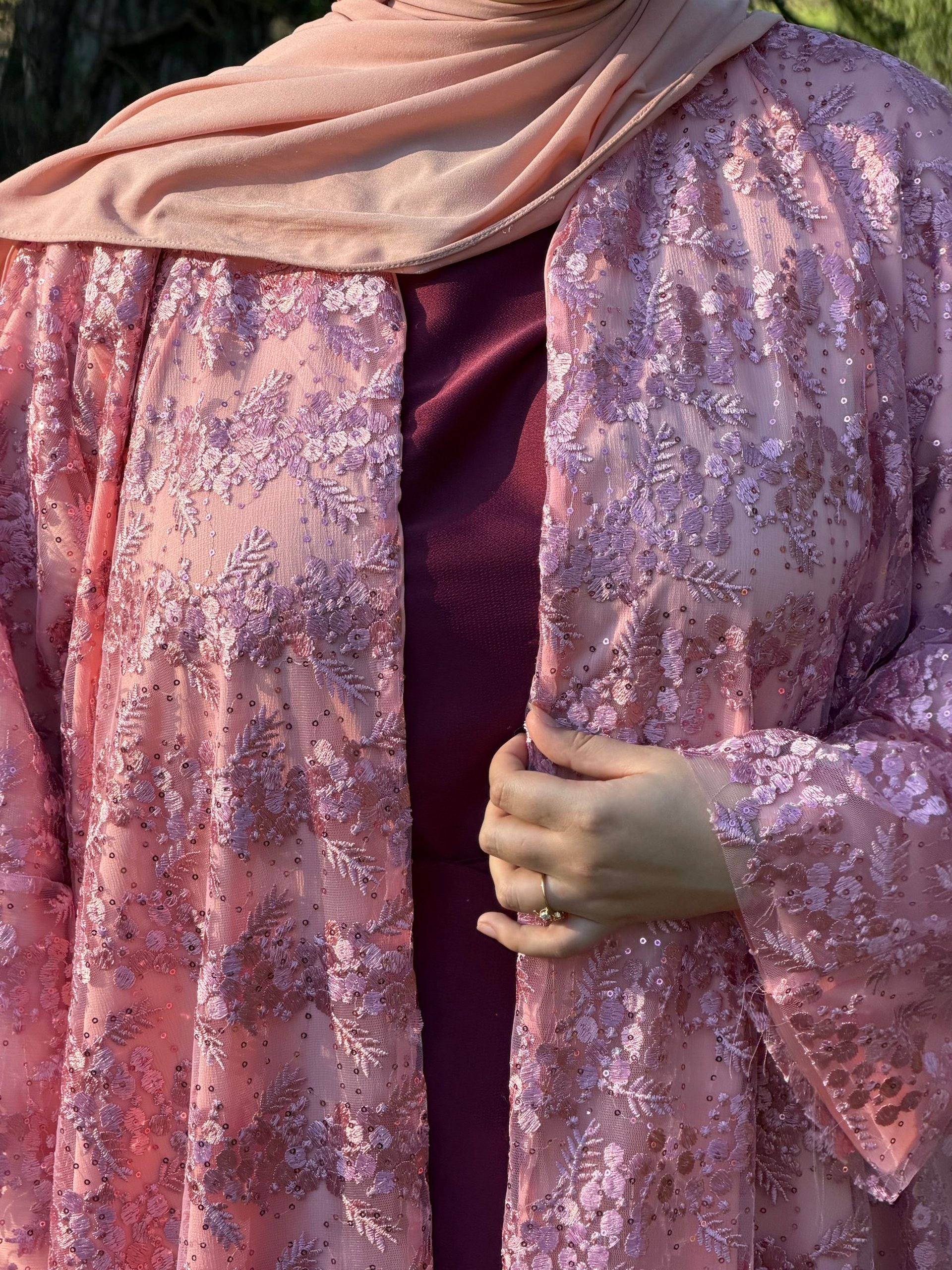 person wearing grey knit sweater