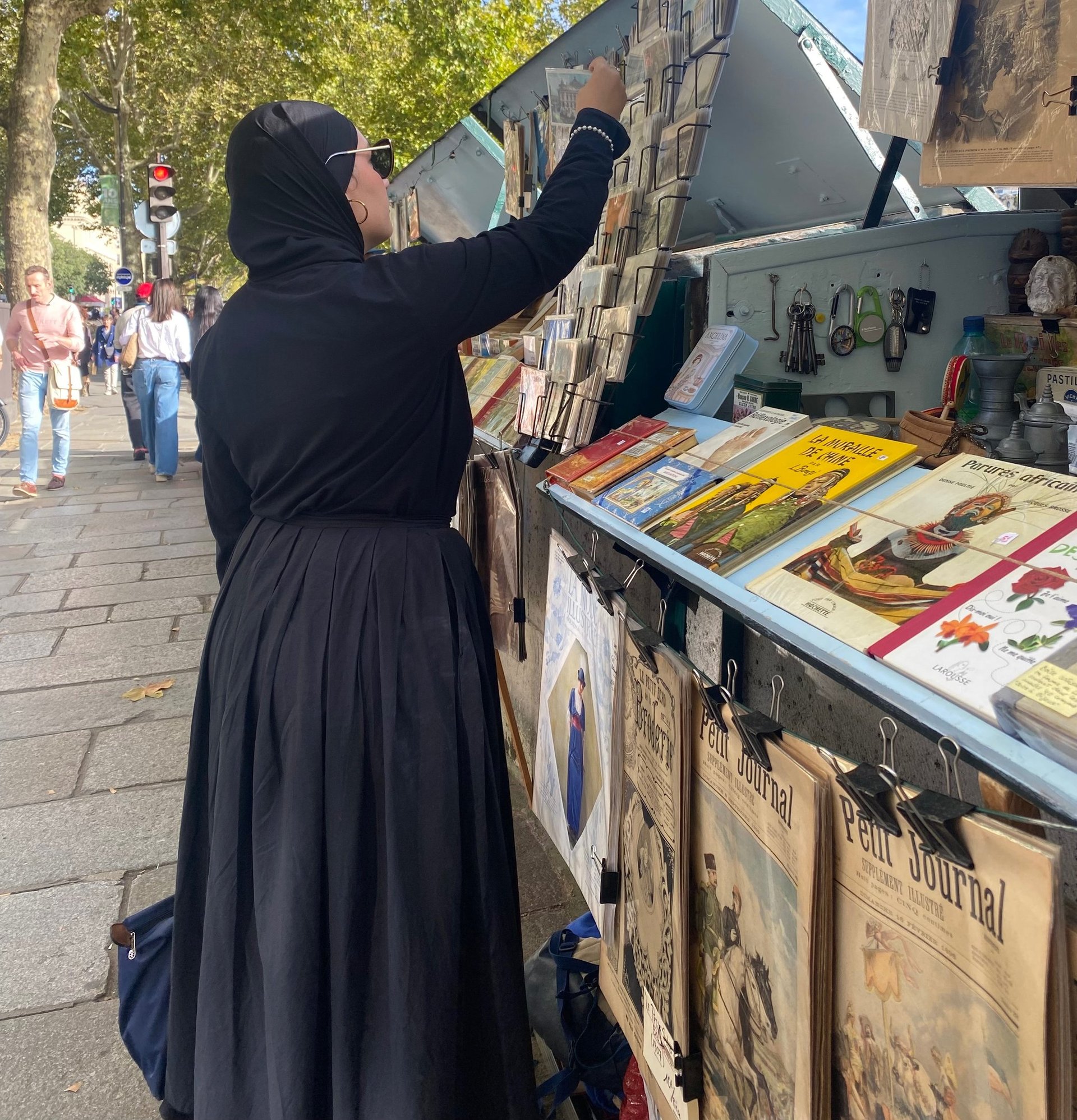 person wearing grey knit sweater