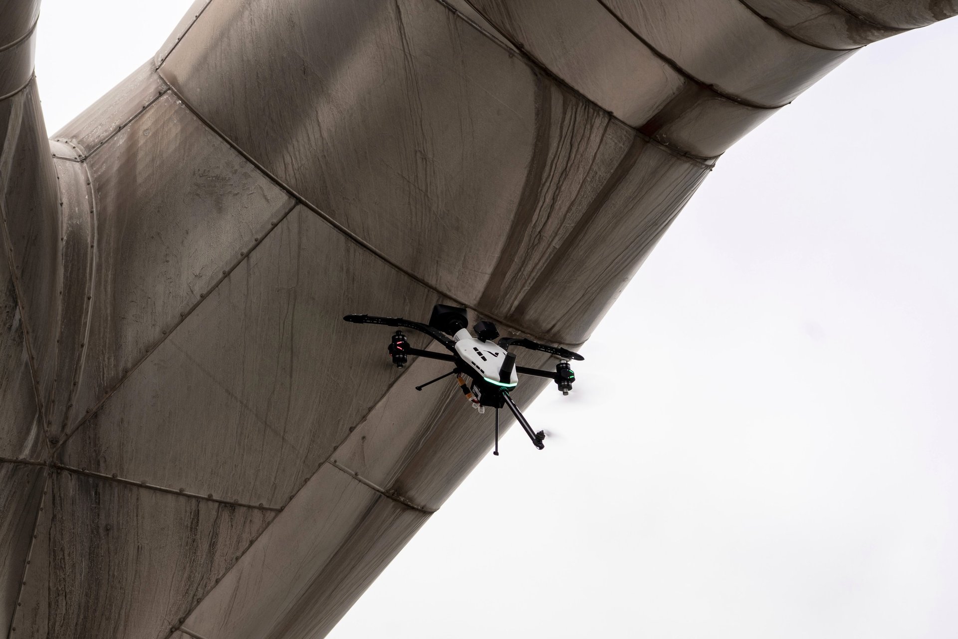 black and red drone flying