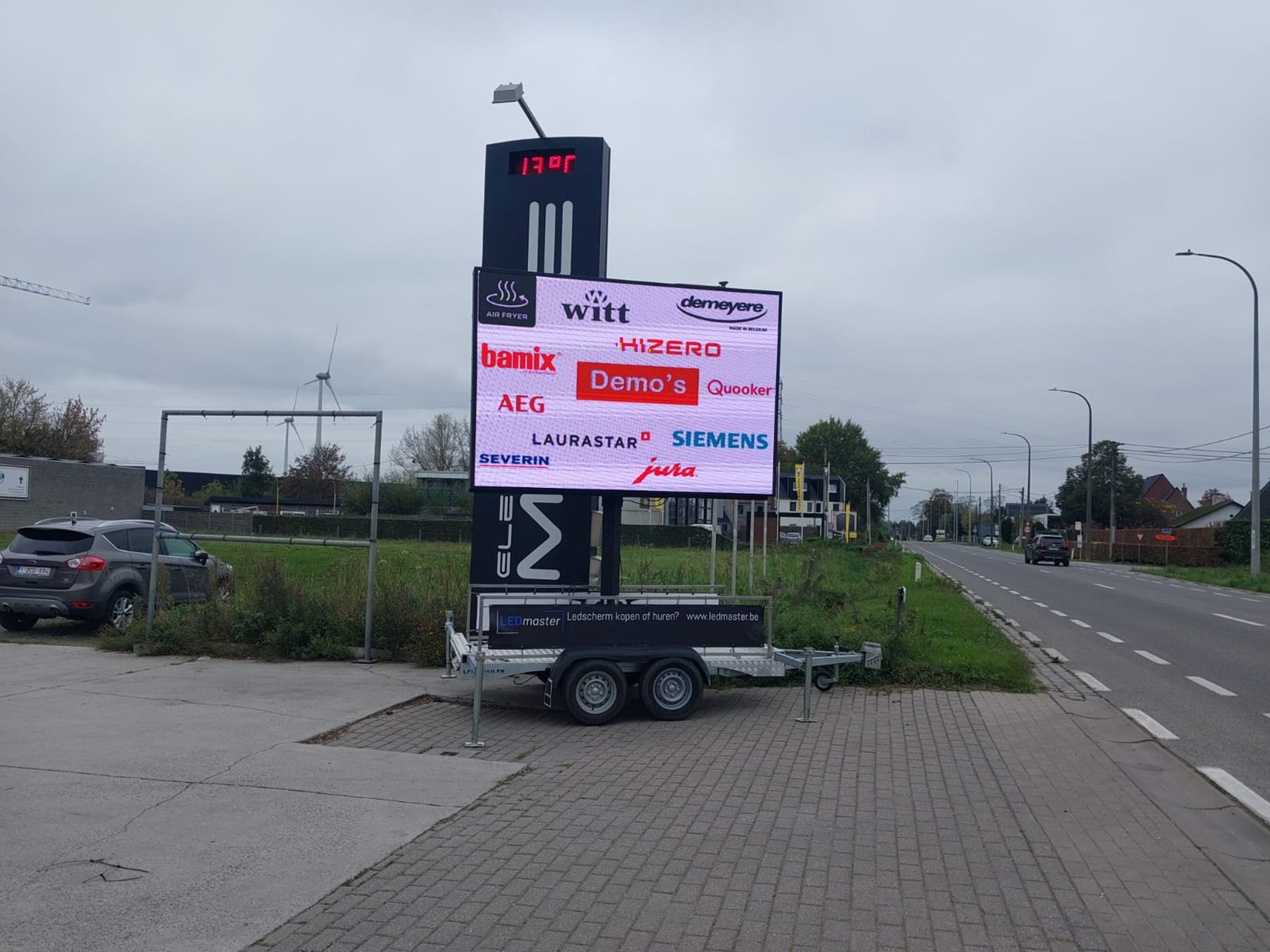 woman wearing yellow long-sleeved dress under white clouds and blue sky during daytime