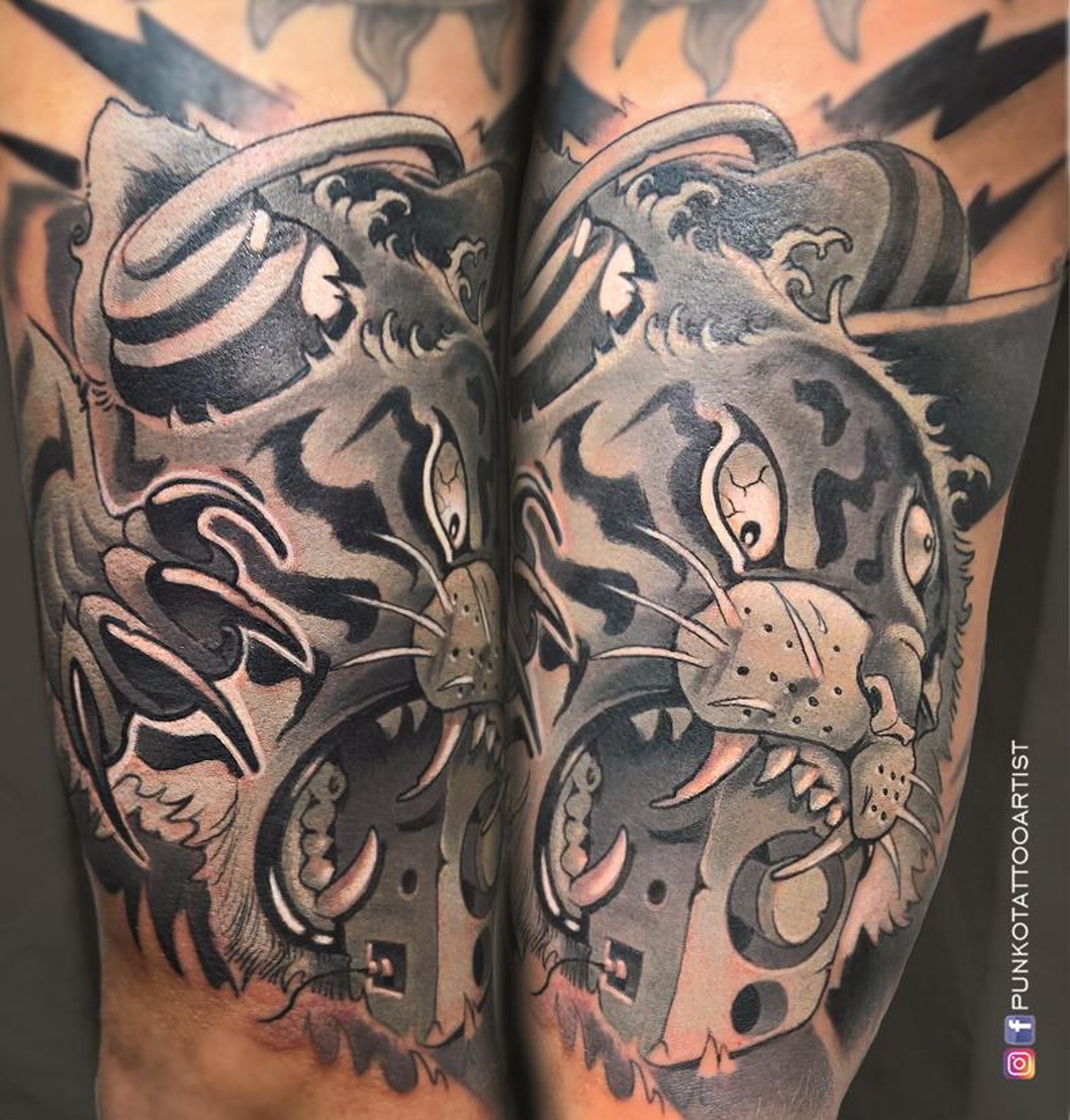 tatuaje de un tigre dj comiendose un bafle. Pieza terminada en el brazo, realizada por **Punkotattooartist en Barcelona**.