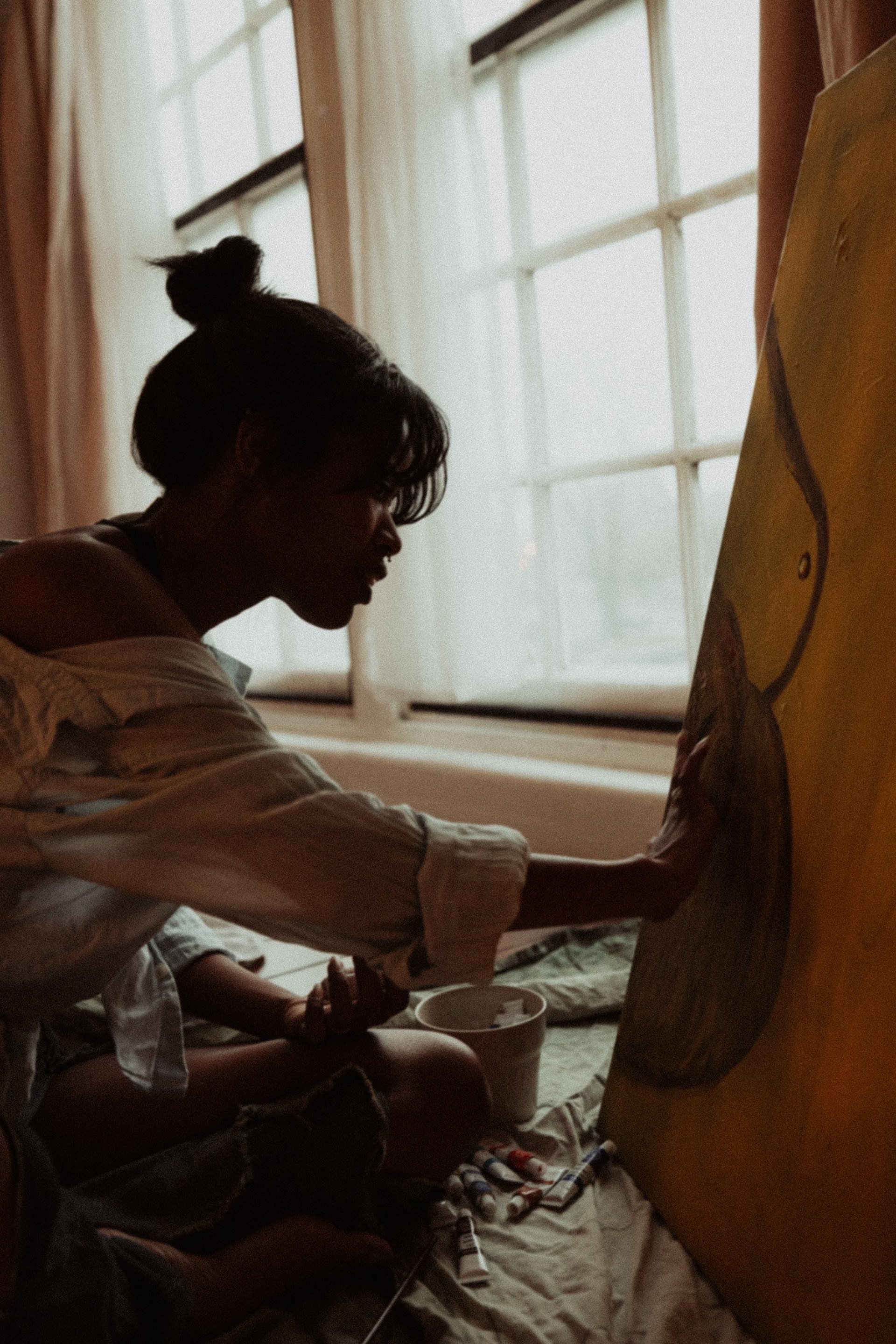 person raising both hands