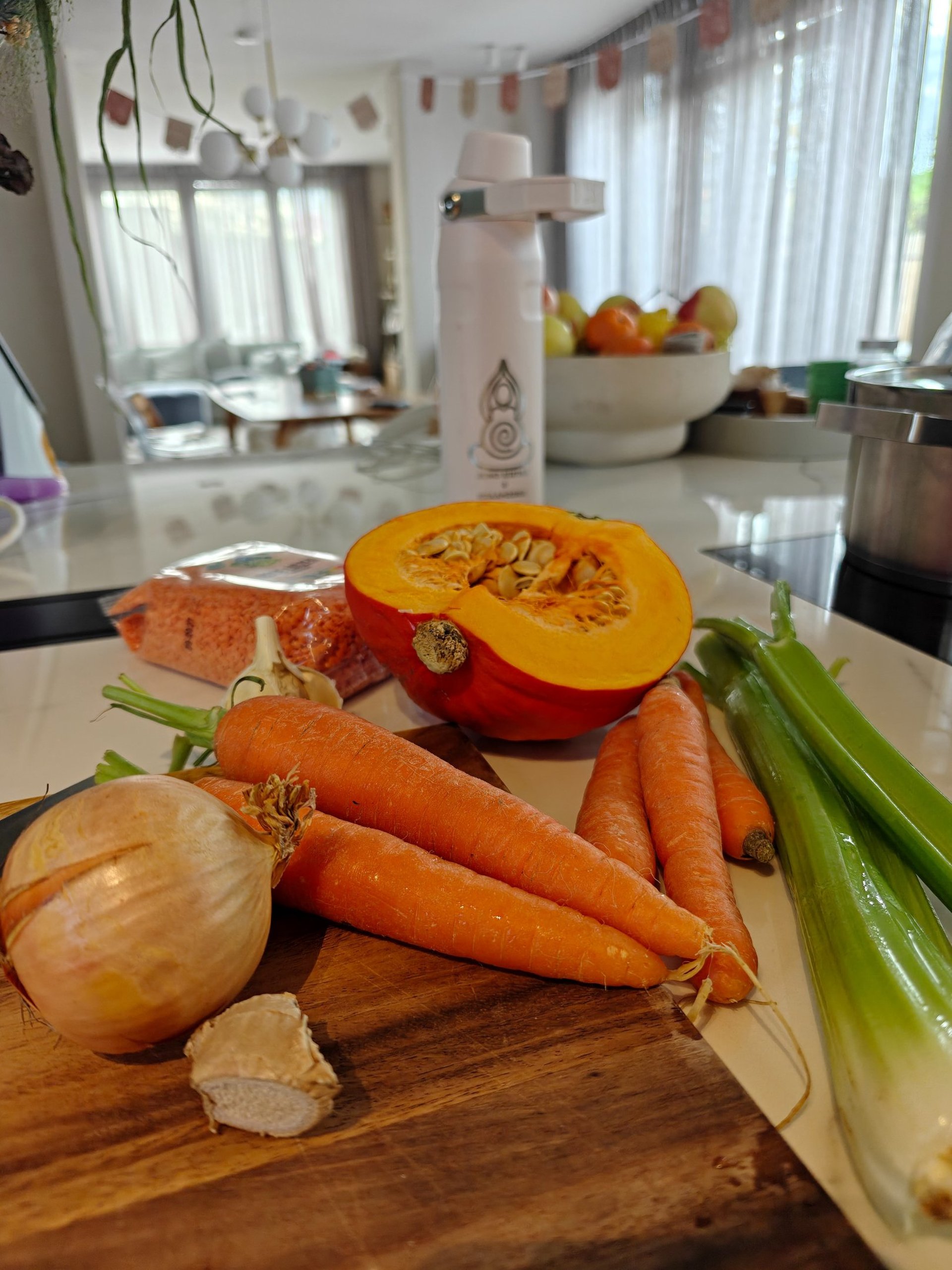 an abstract photo of a curved building with a blue sky in the background