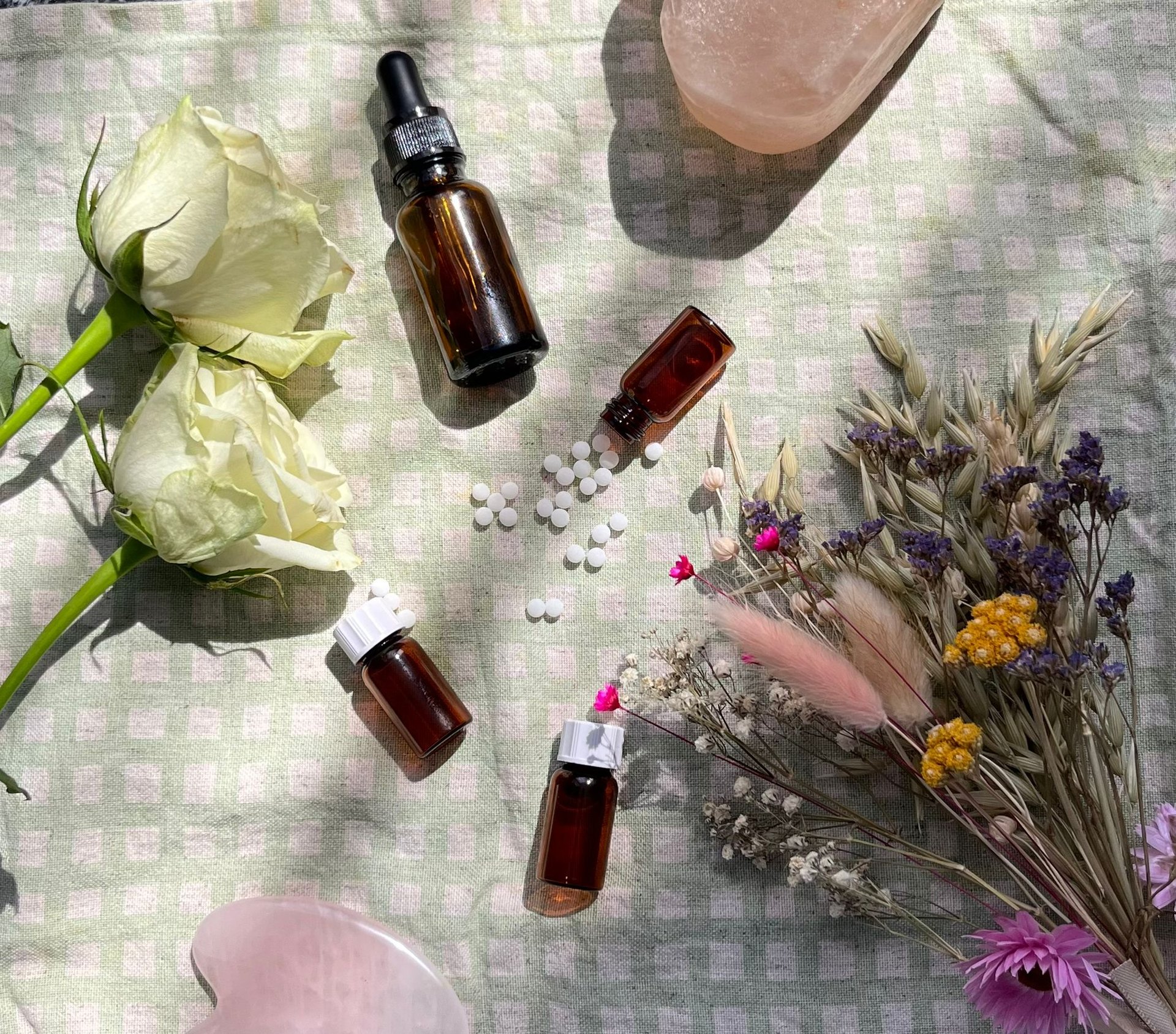 a table topped with bottles of essential oils