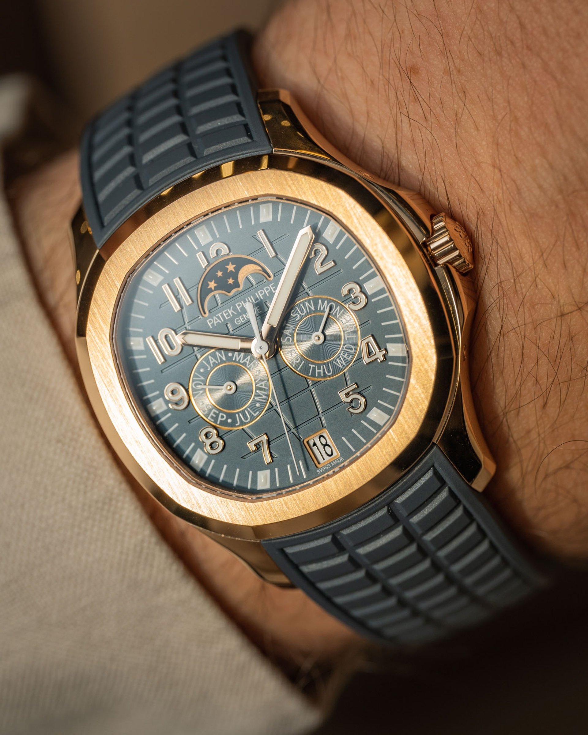 blue and silver round analog watch