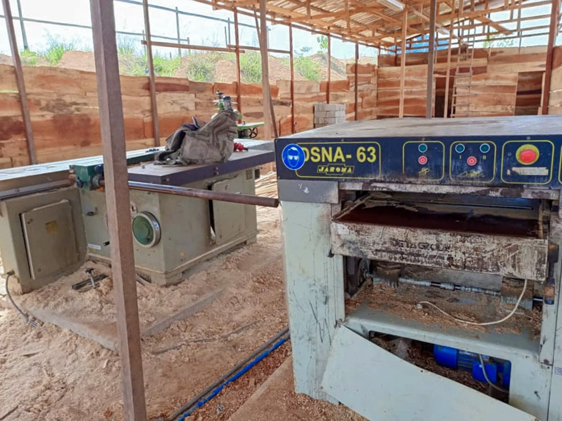 woman wearing yellow long-sleeved dress under white clouds and blue sky during daytime
