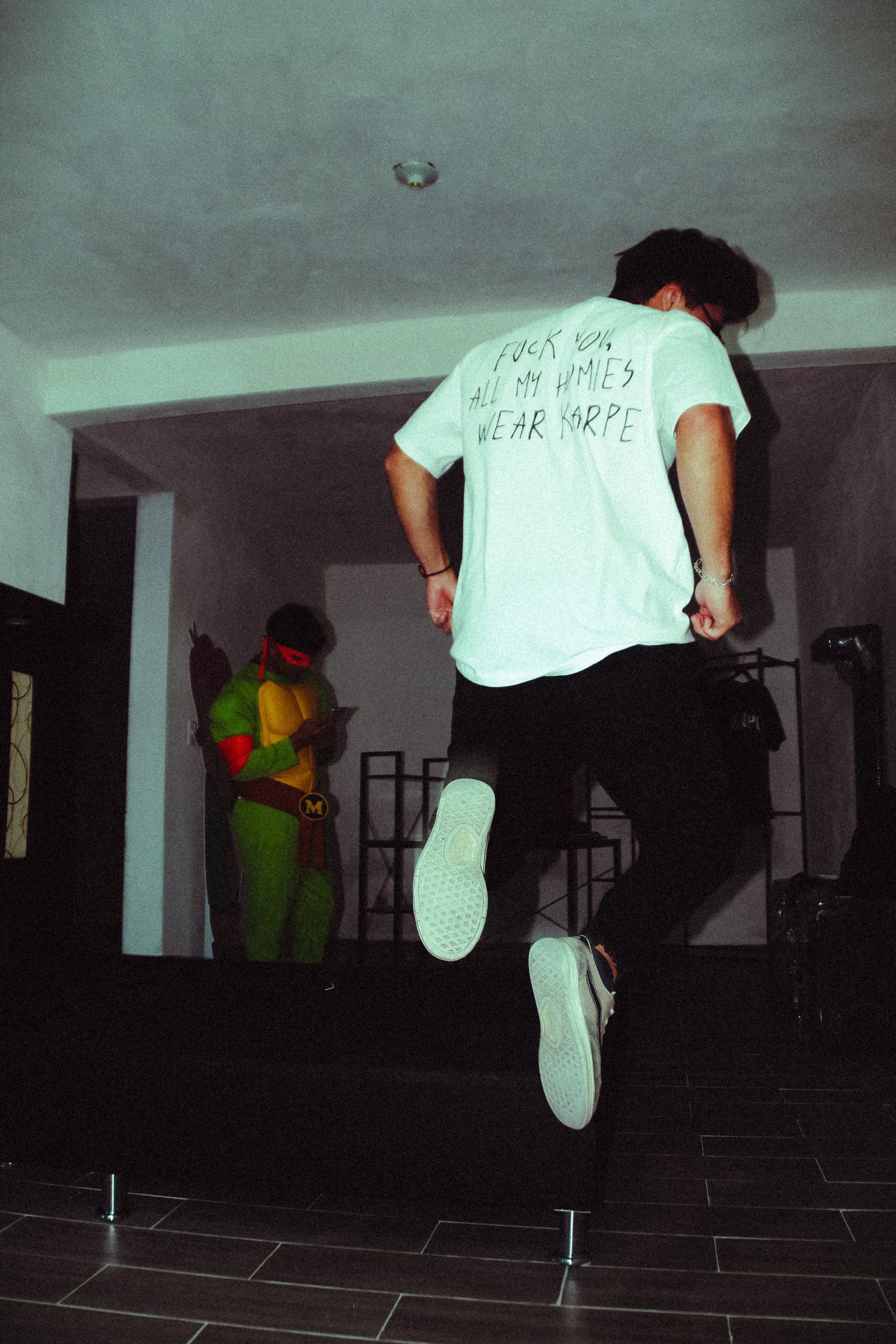 an abstract photo of a curved building with a blue sky in the background
