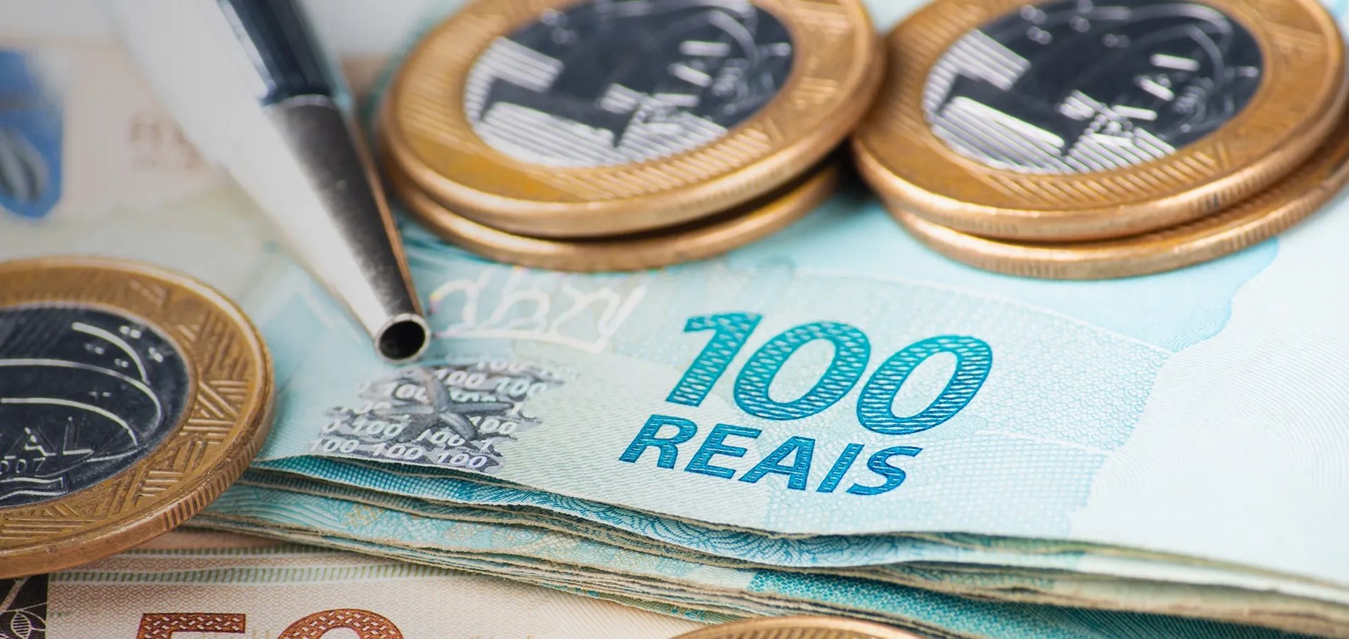 an abstract photo of a curved building with a blue sky in the background