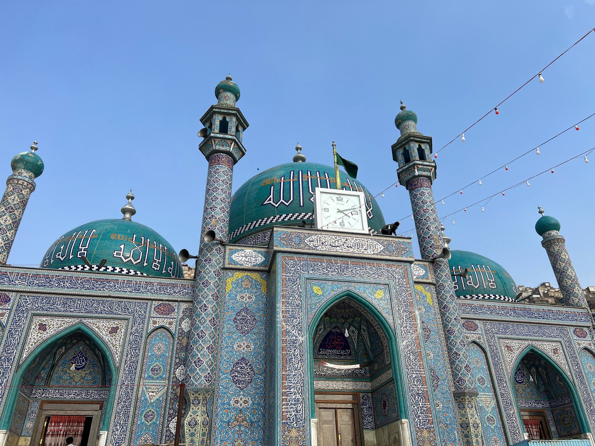 woman wearing yellow long-sleeved dress under white clouds and blue sky during daytime