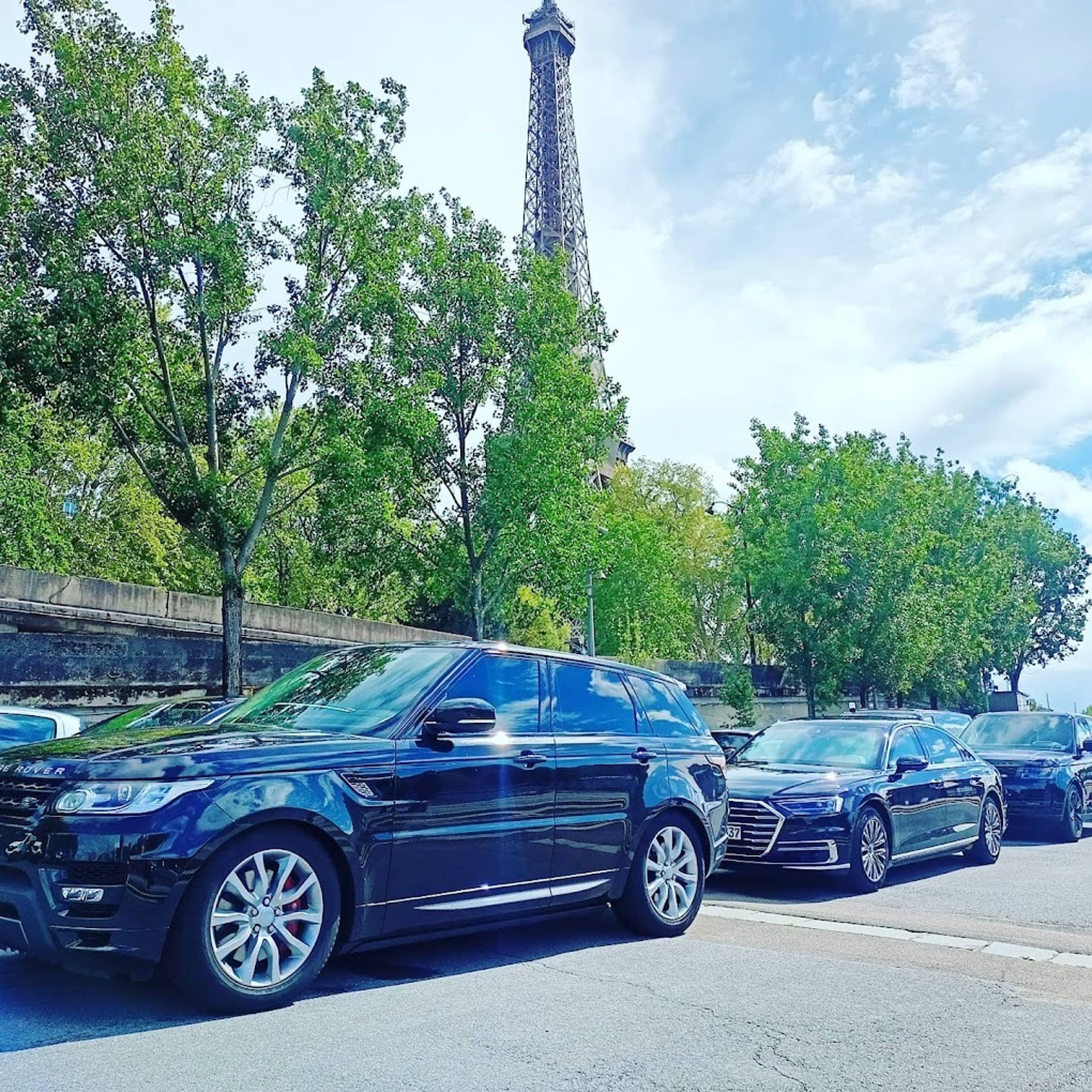 black and brown leather padded tub sofa