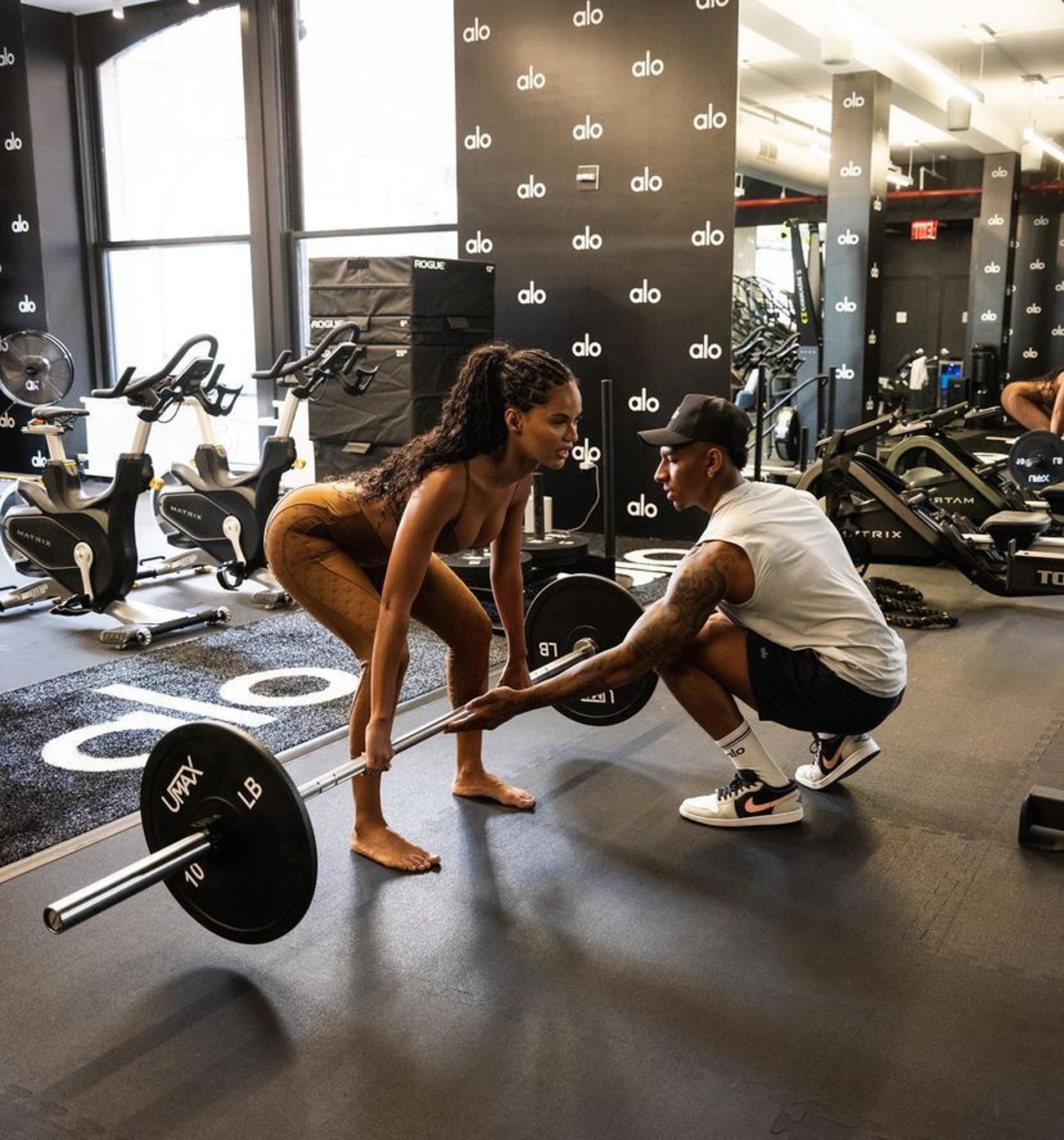 an abstract photo of a curved building with a blue sky in the background