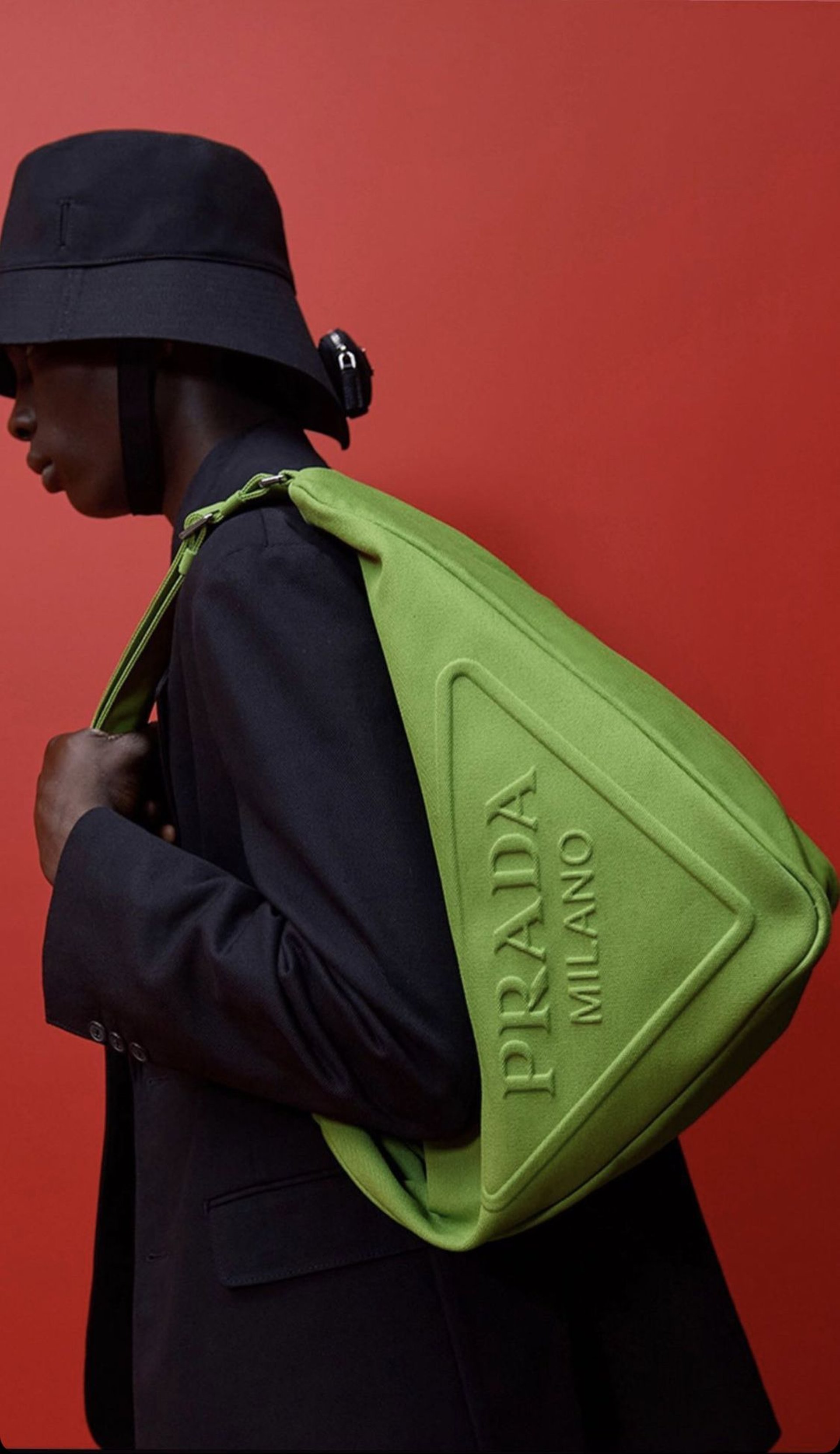 an abstract photo of a curved building with a blue sky in the background