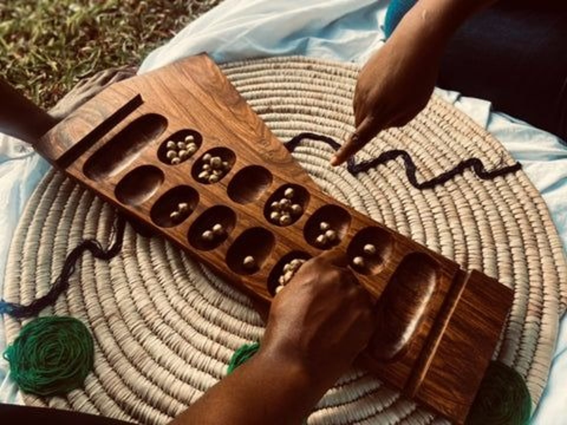 an abstract photo of a curved building with a blue sky in the background