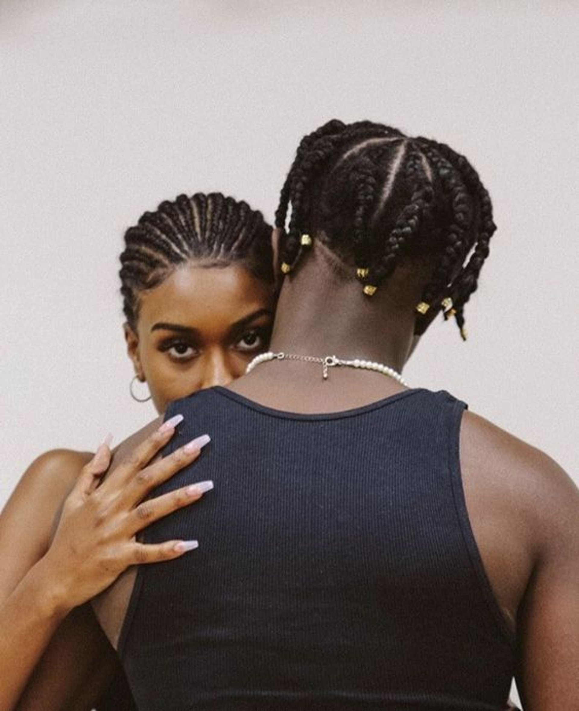 an abstract photo of a curved building with a blue sky in the background
