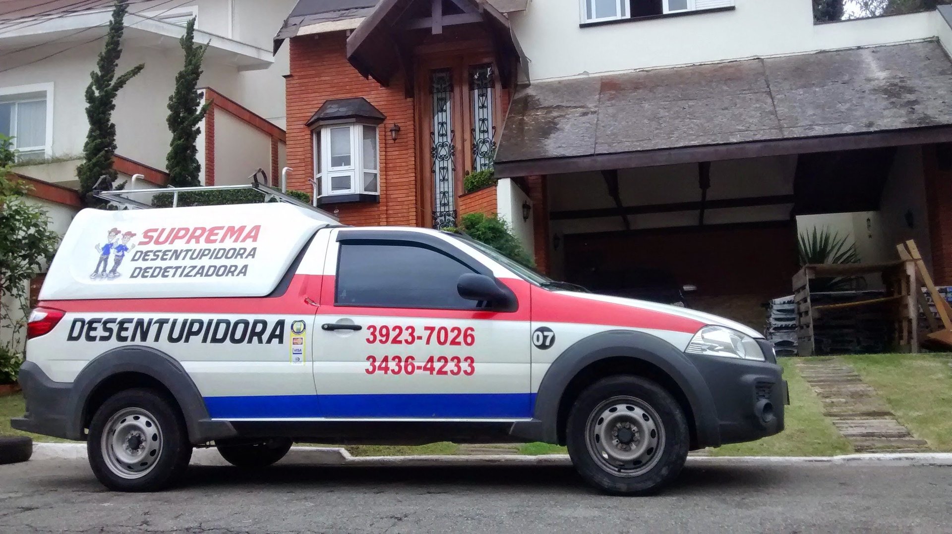 an abstract photo of a curved building with a blue sky in the background