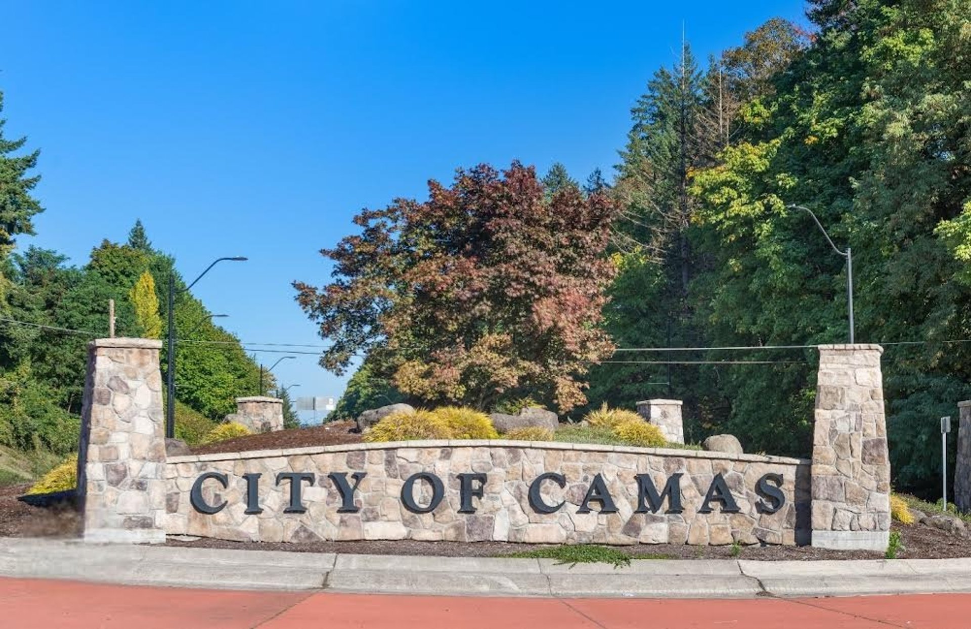 woman wearing yellow long-sleeved dress under white clouds and blue sky during daytime