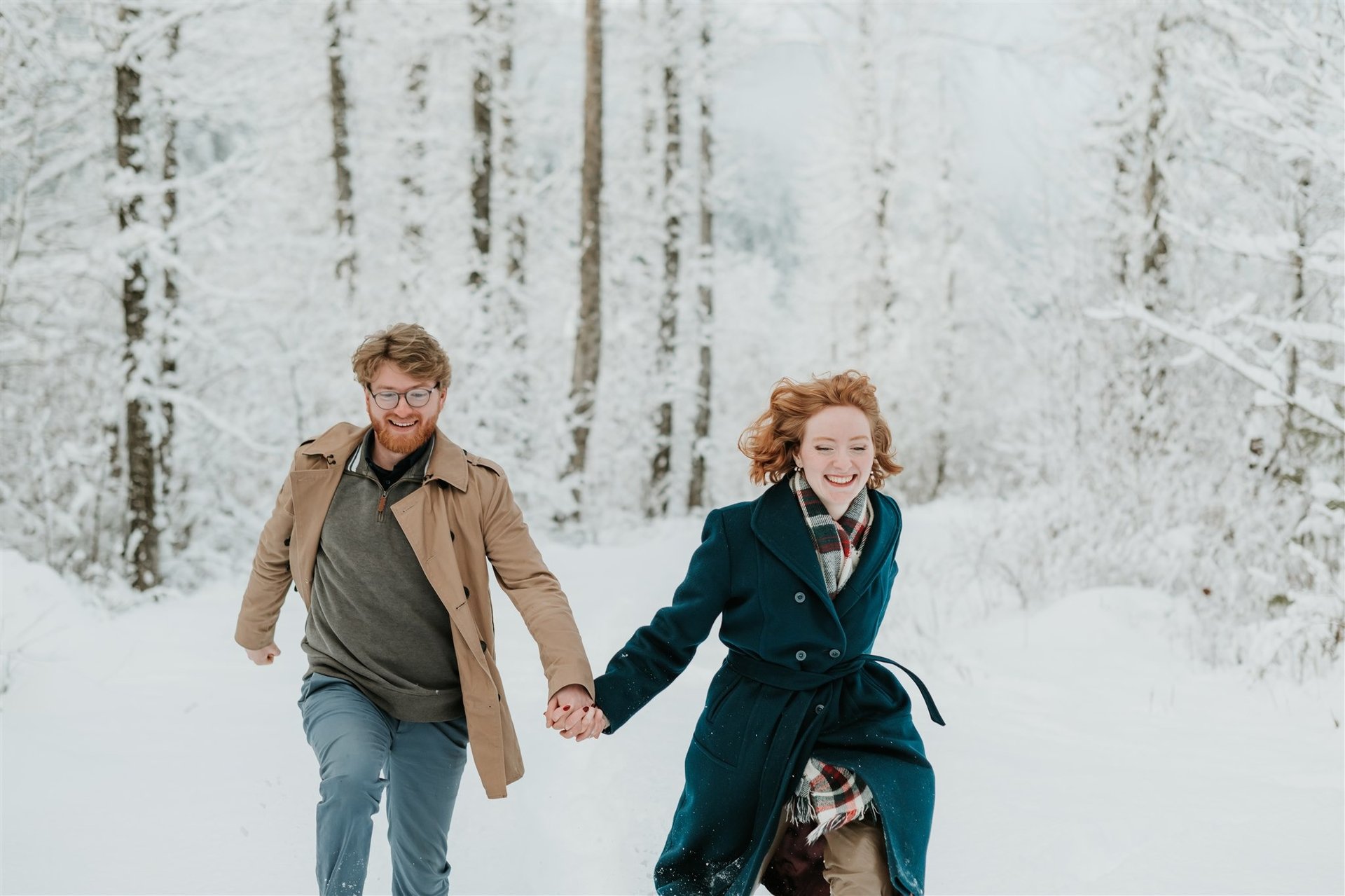 couple wearing silver-colored rings